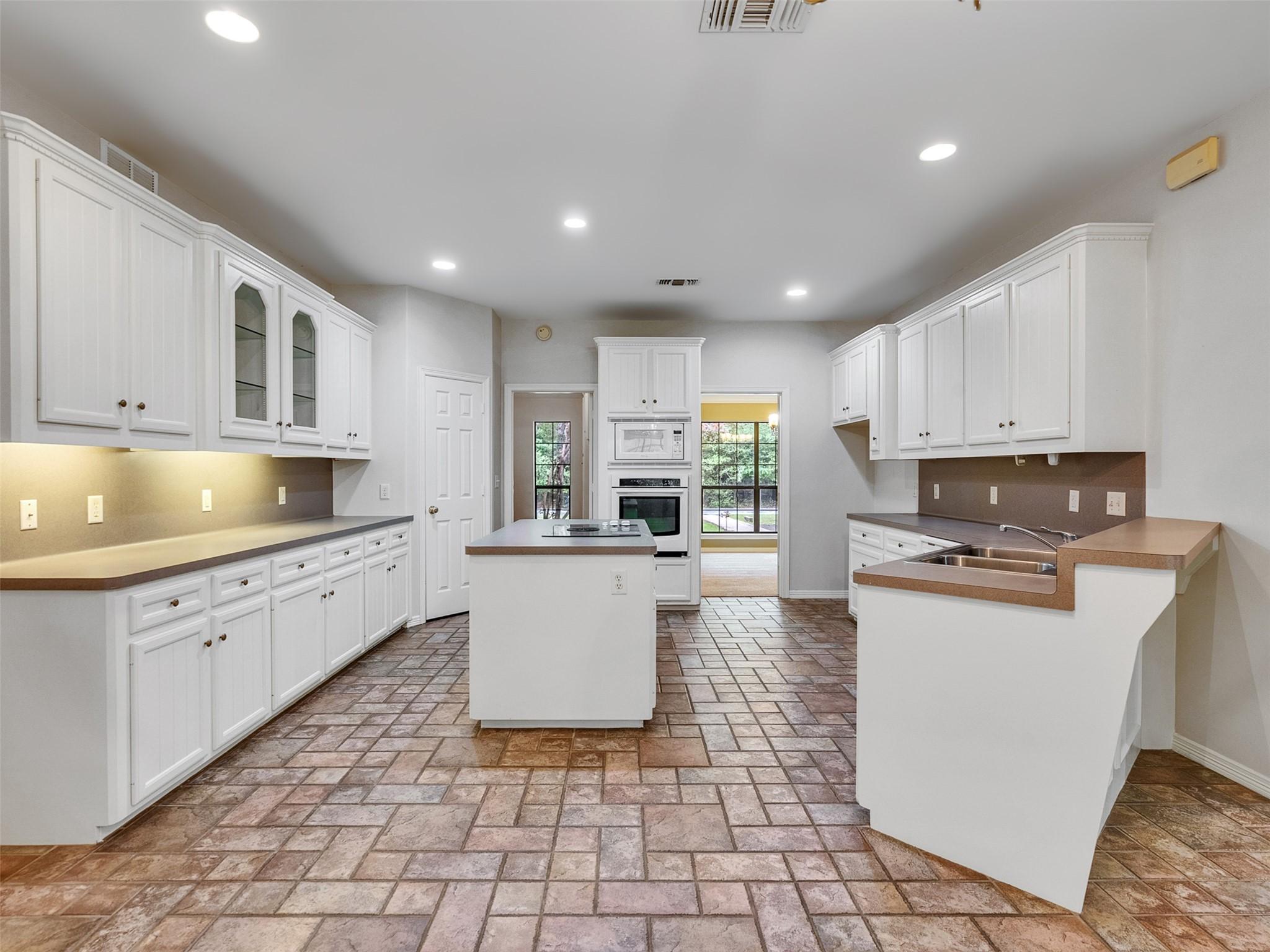 Image 1: Huge kitchen with a walk in pantry.