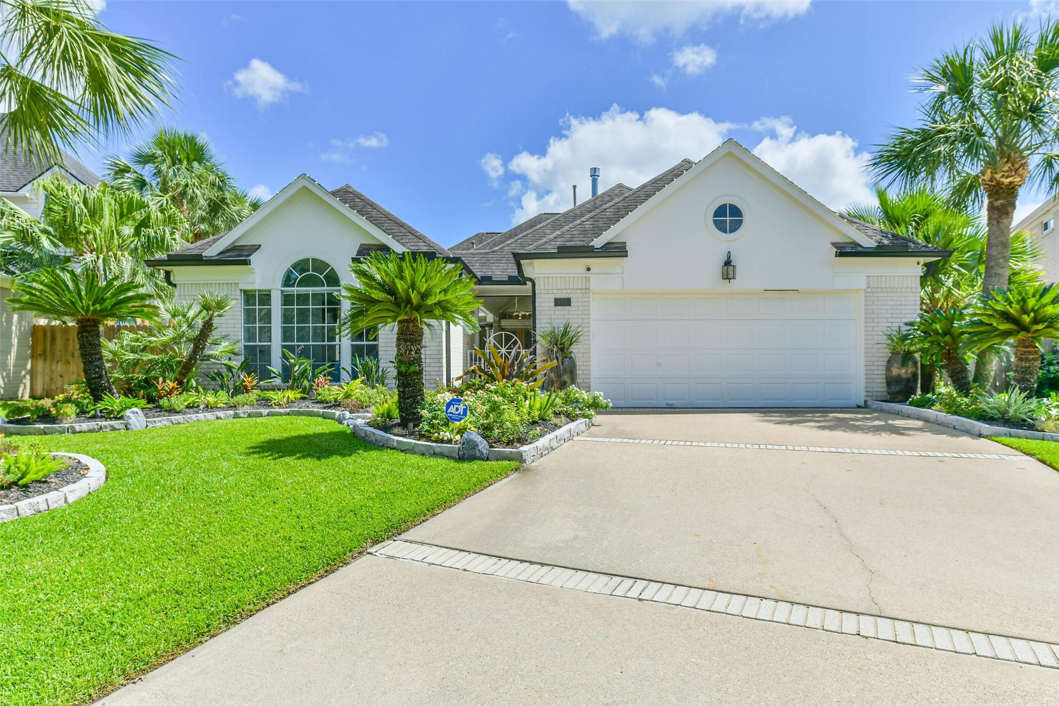Image 1: Welcome home to your very own oasis in the heart o