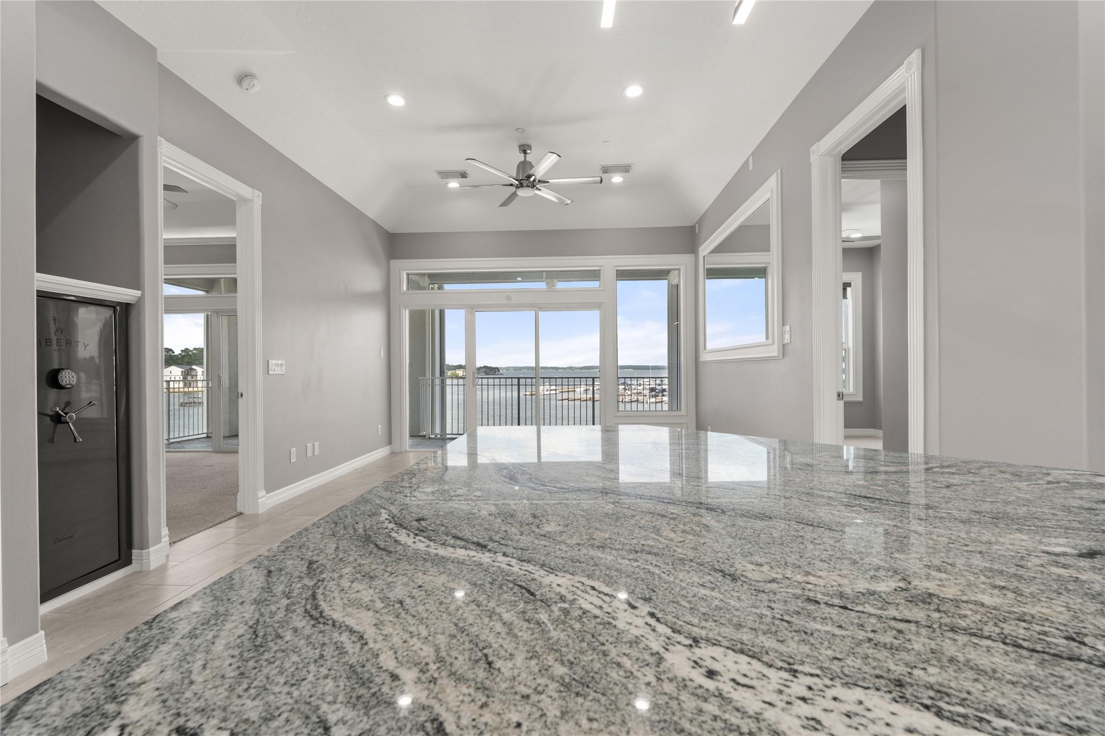 Image 3: This modern home features an open living area with