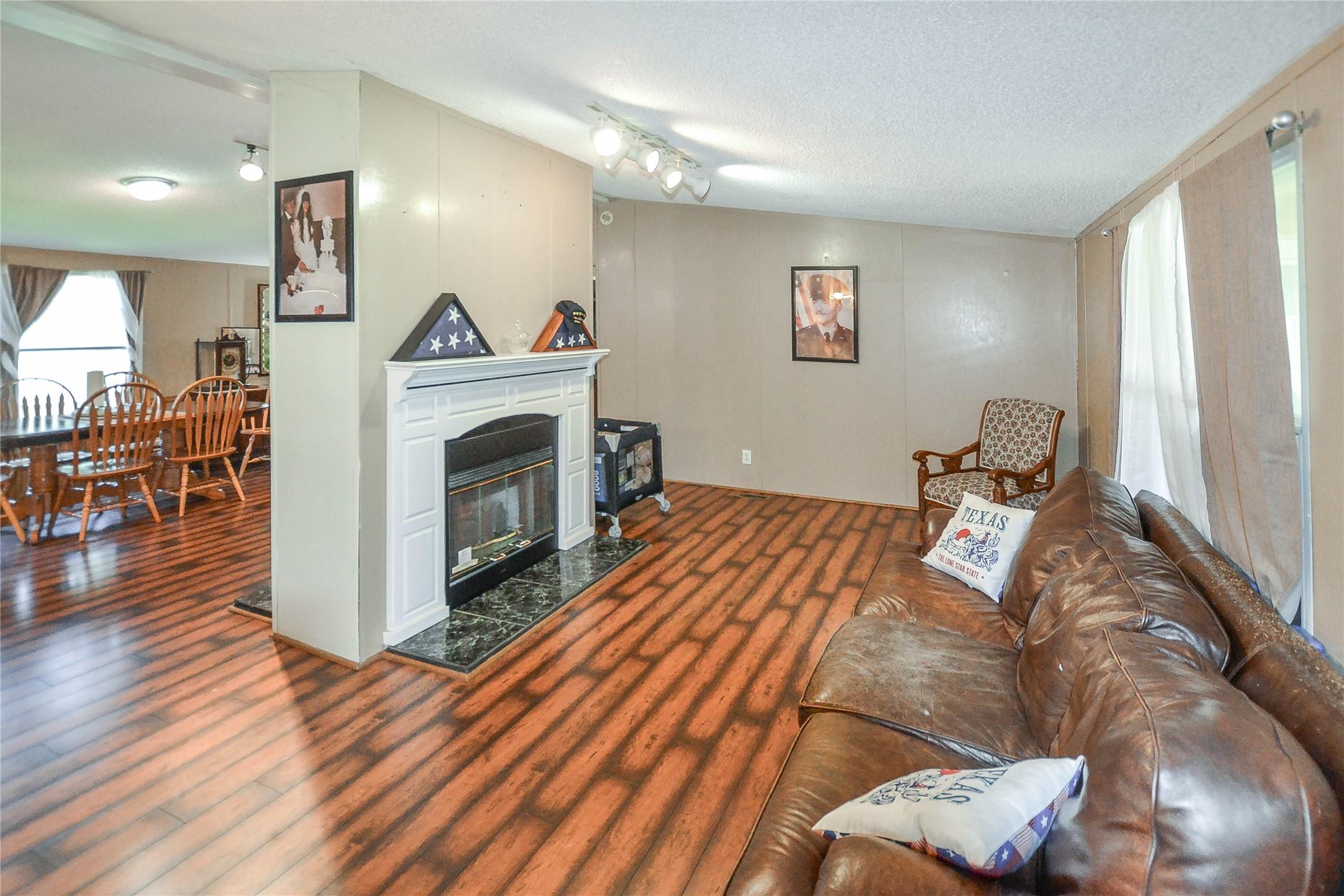 Image 4: Living room from the front door with a double side