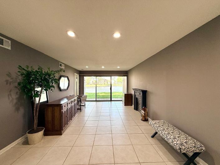 Image 3: Step into the inviting living area that seamlessly