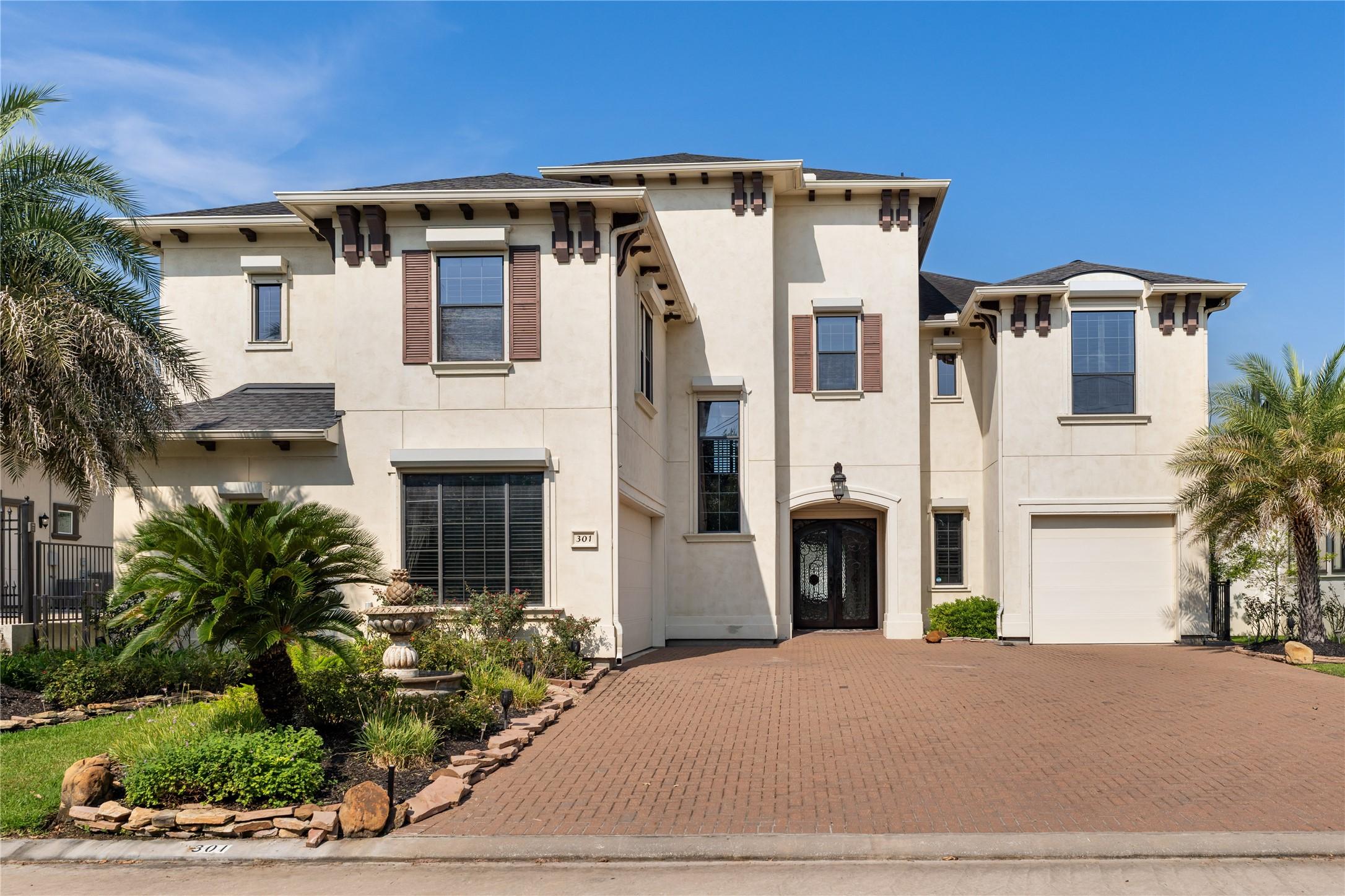 Image 1: Experience waterfront living in this stunning 5-be