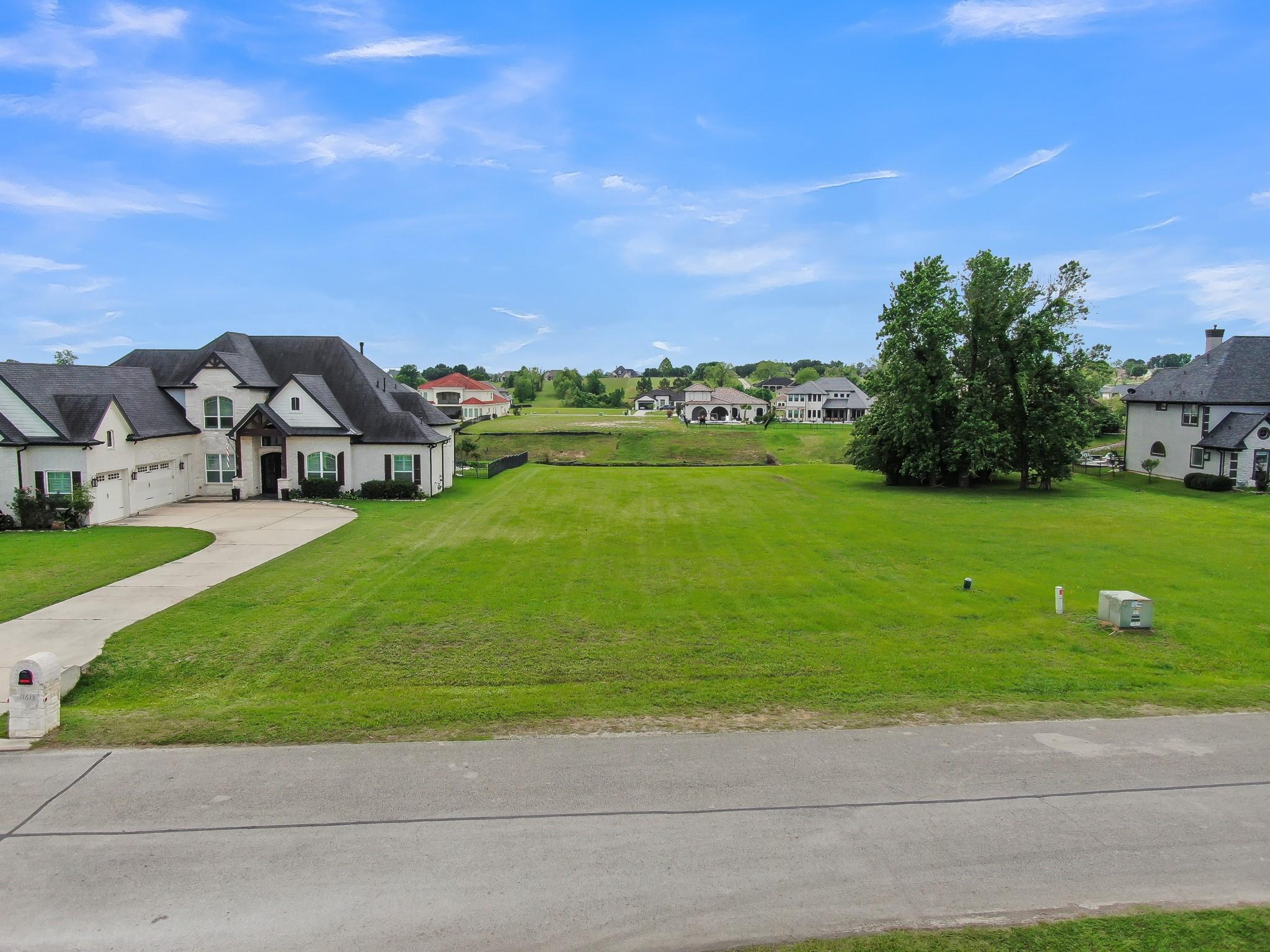 Image 1: A prime half acre canal-front lot ready for your d