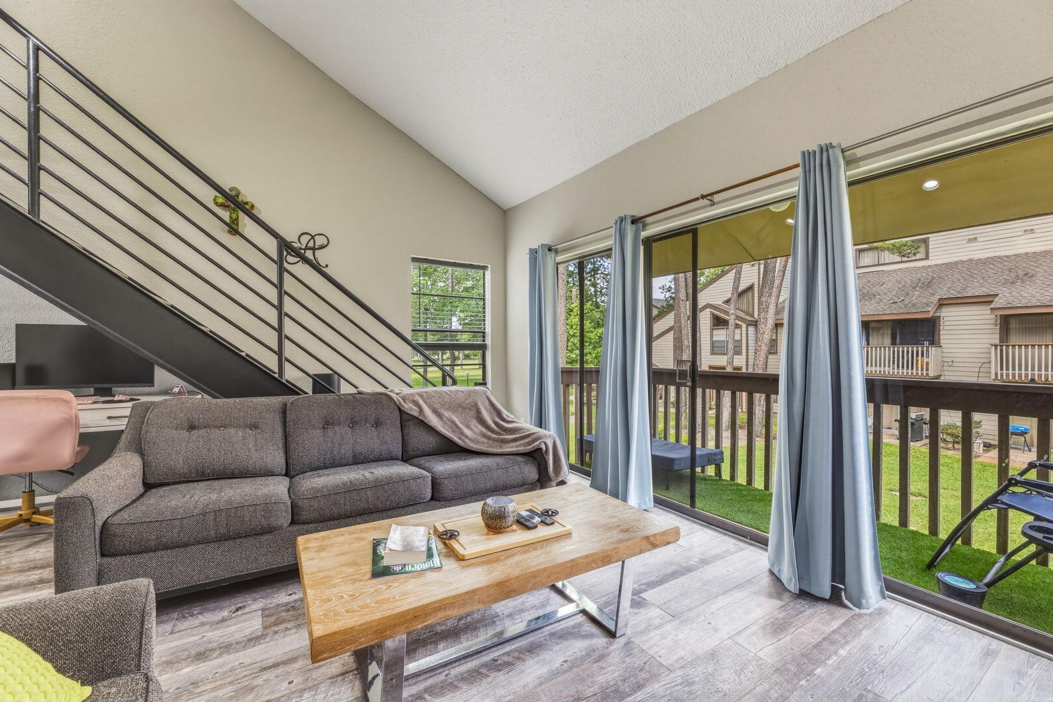 Image 1: Bright open living area with extra window and huge