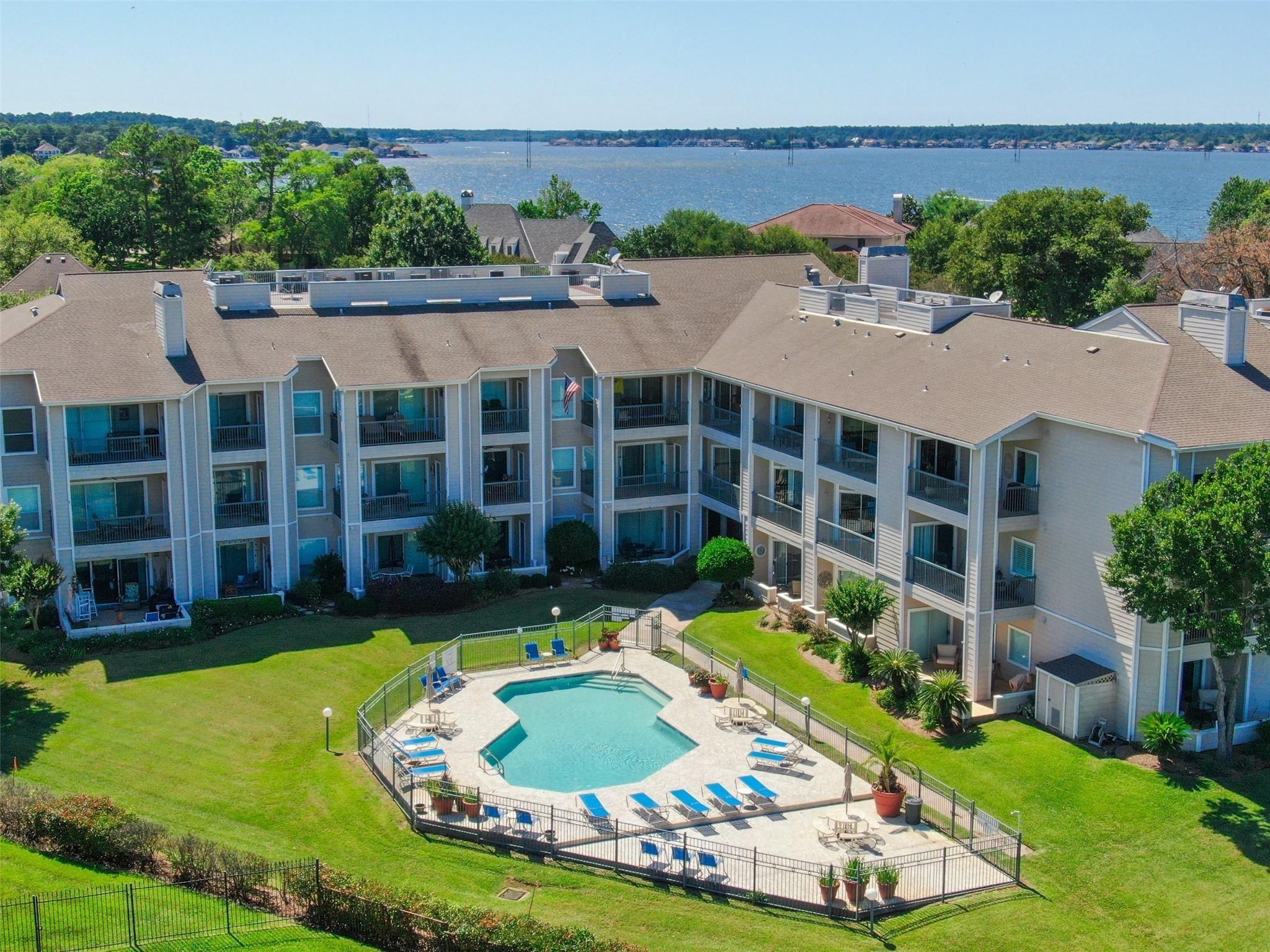 Image 2: Pool Area, The Lake is in the distance of the Fron