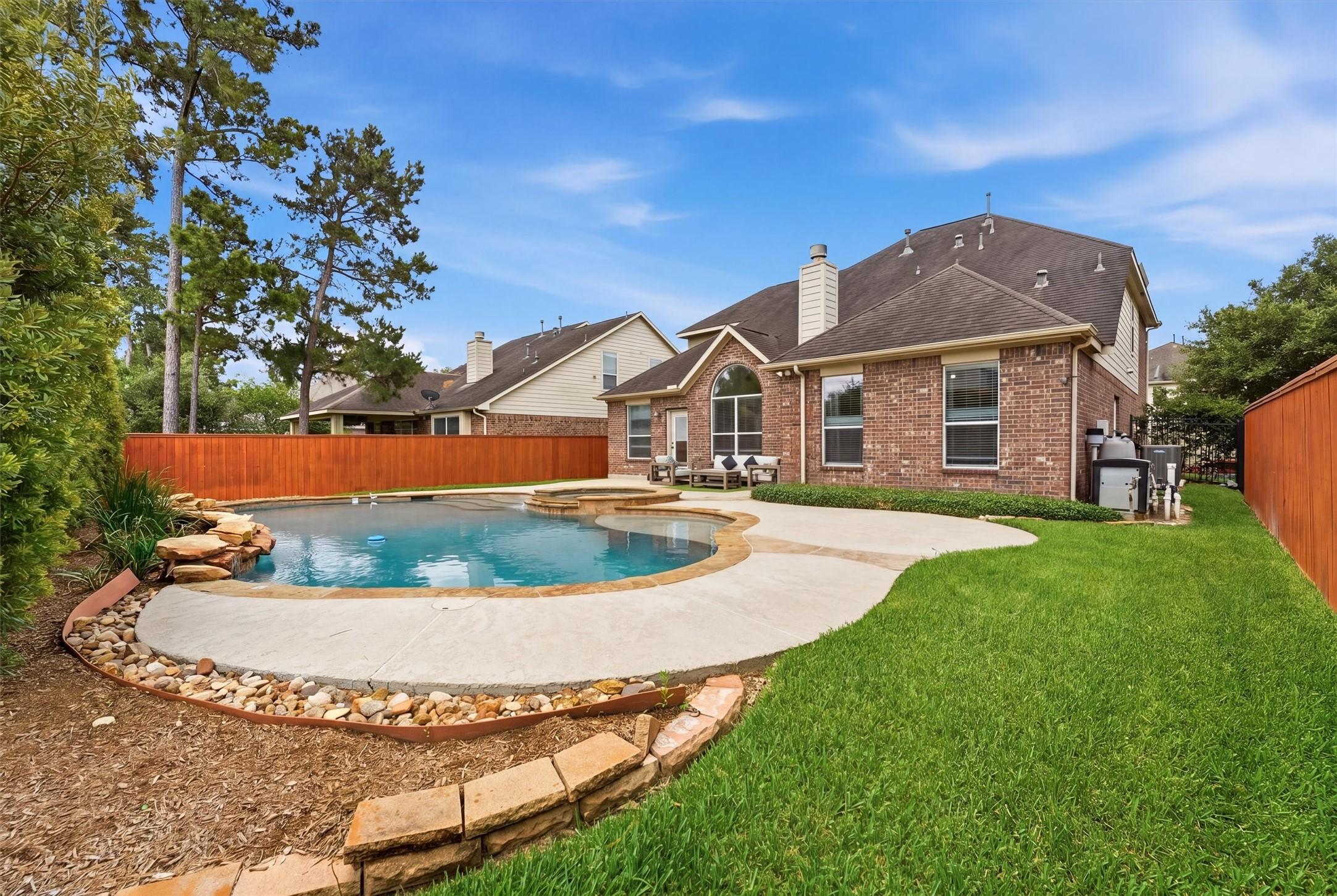 Image 1: Charming two-story brick home with a well-maintain