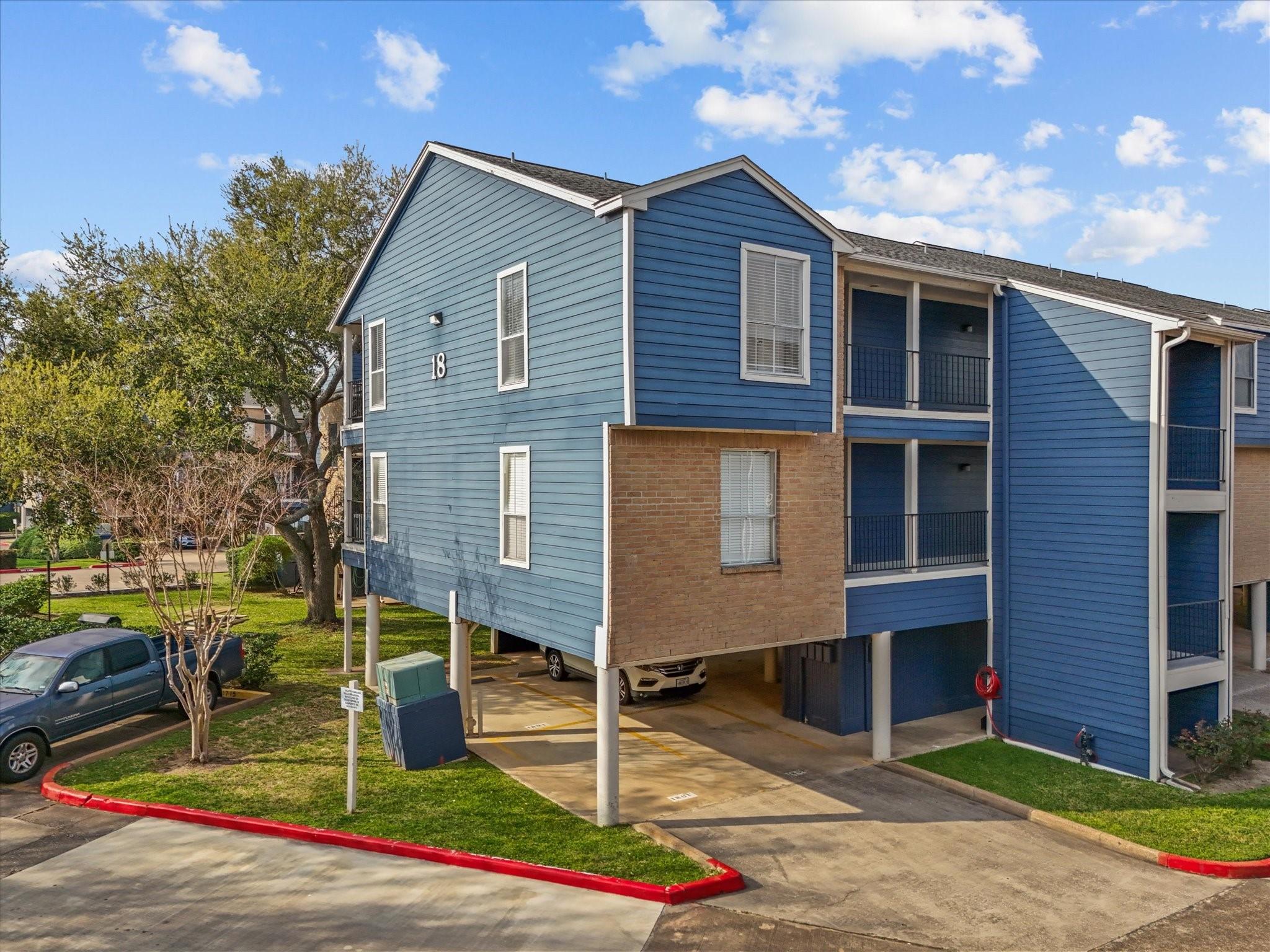 Image 1: This home sits on a corner location with double pa