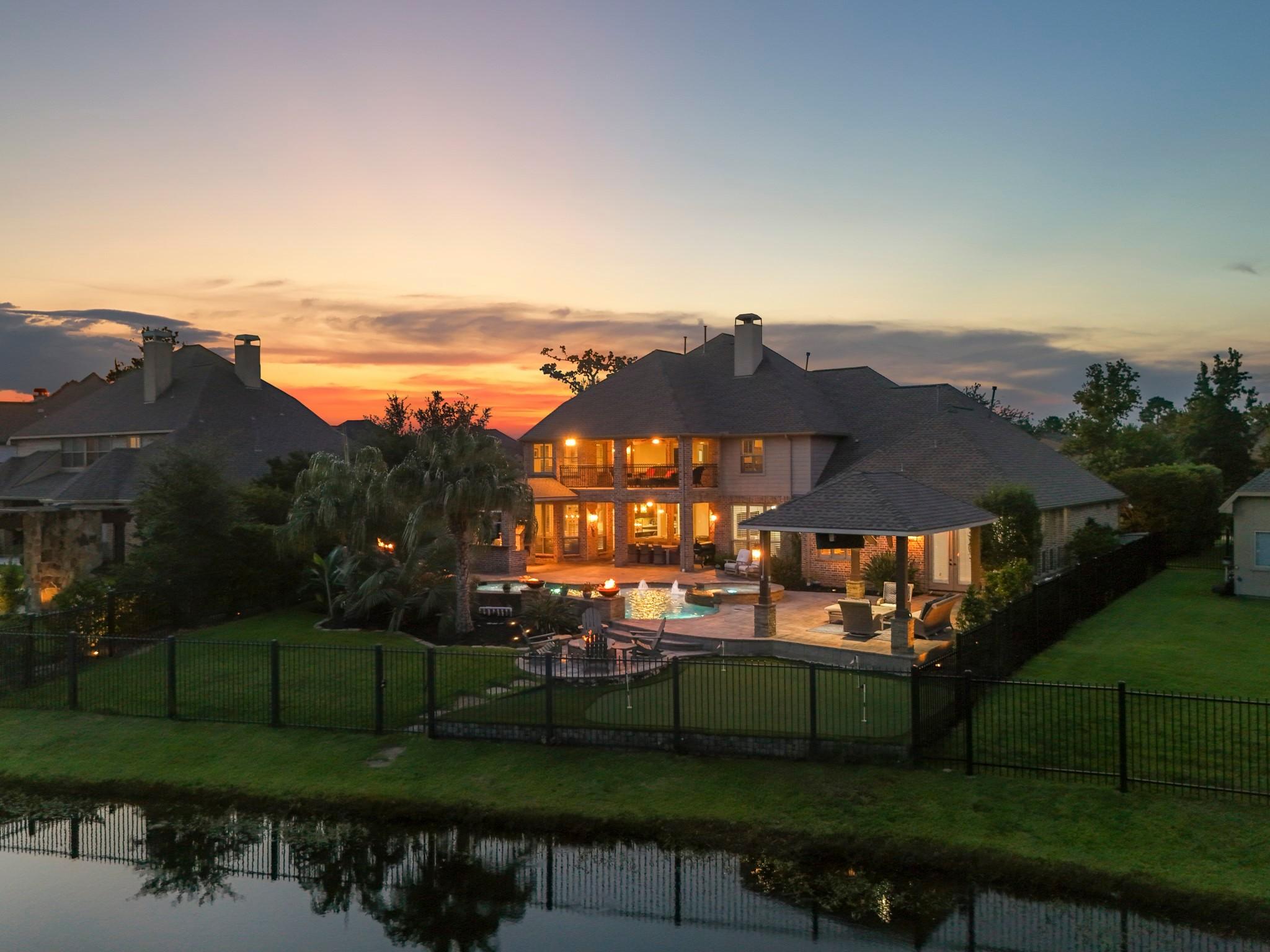 Image 2: An oasis on the lake! Gunite heated pool with buil