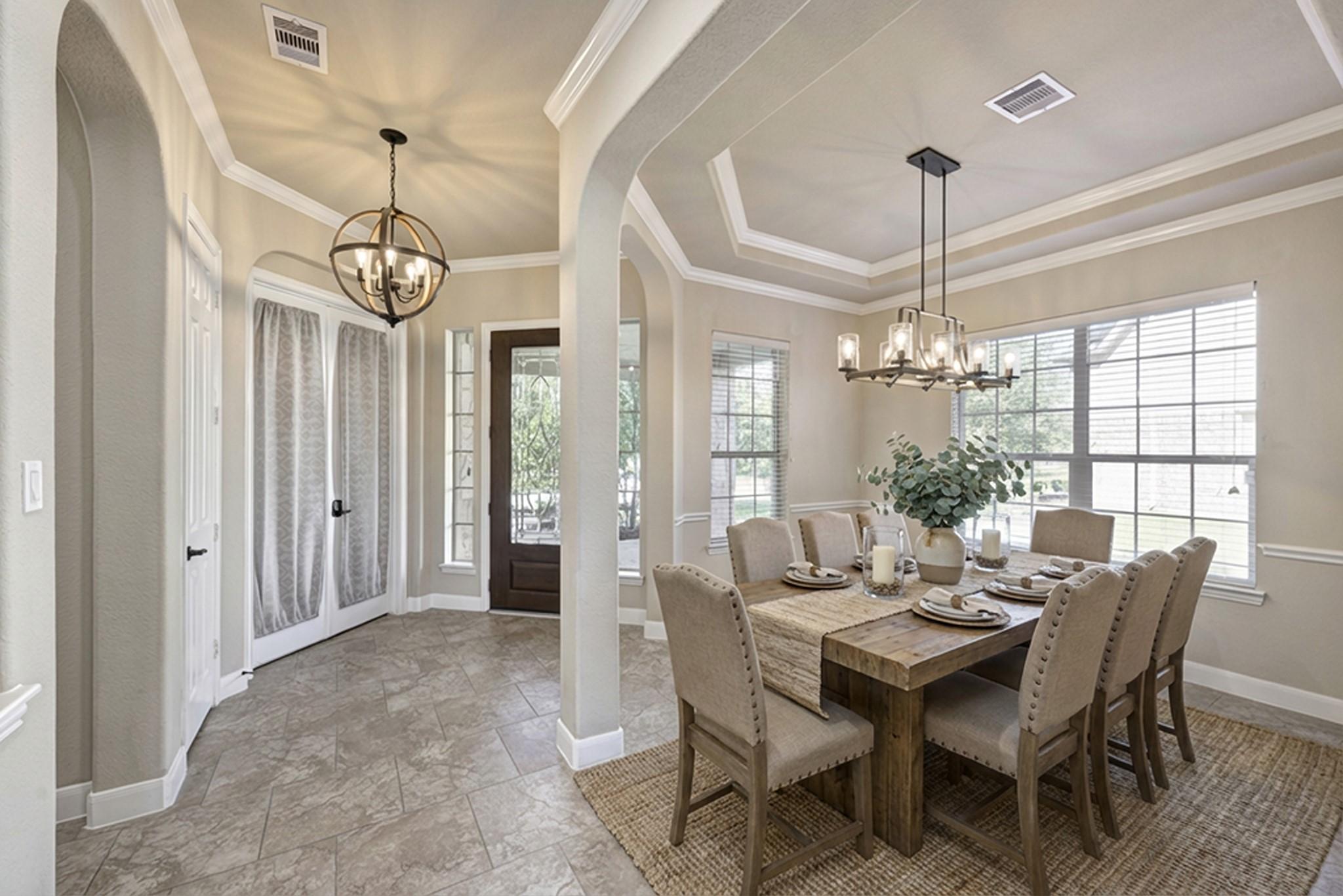 Image 3: Step inside to a gracious foyer with formal dining