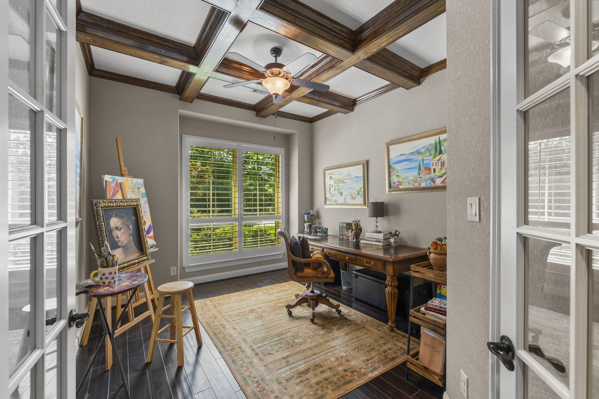 Image 4: Large Window and Wood Beam Accents Provide an Invi