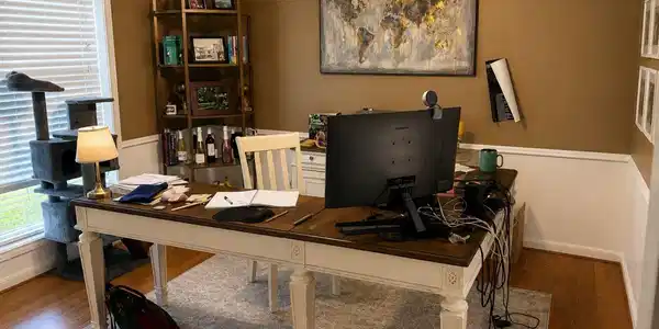 Image 4: Charming home office featuring warm tones, hardwoo