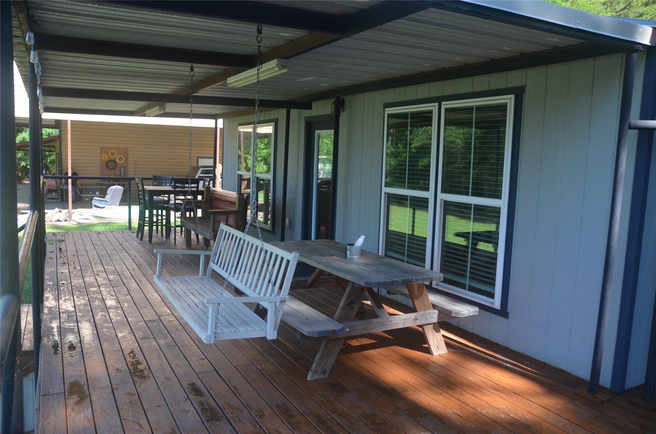 Image 3: Sit Back on the Large Covered Front Porch (37'x12'