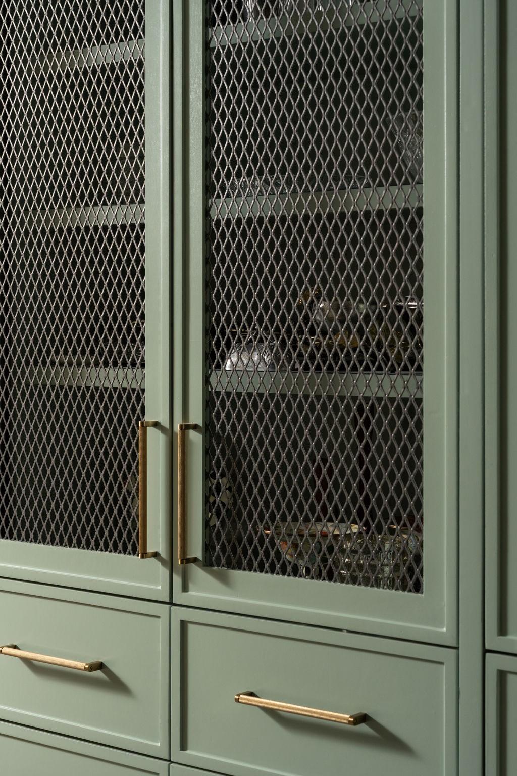 Image 4: The butler's pantry features custom fluted cabinet