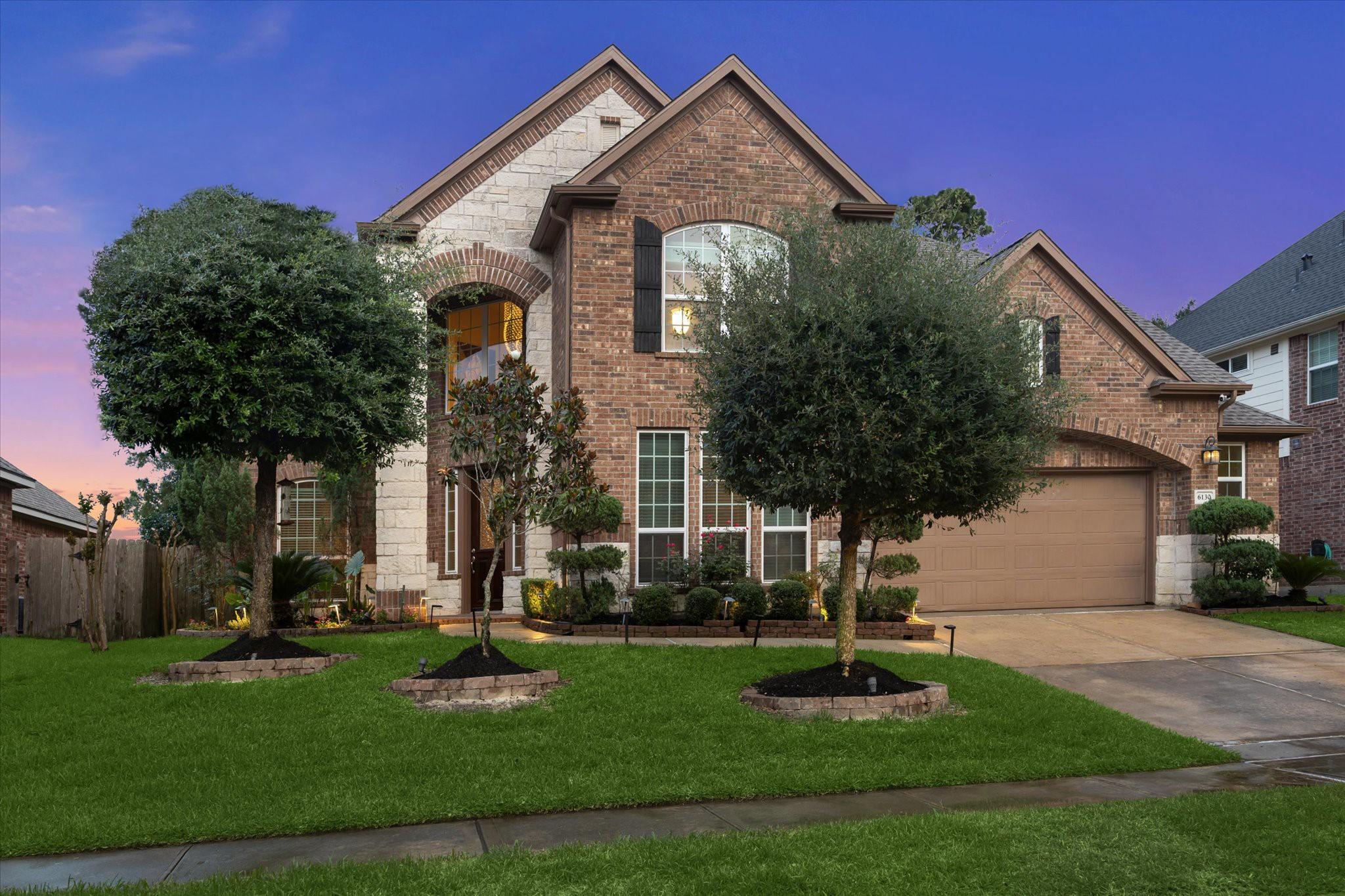 Image 1: 6130 Riverchase Glen offers excellent curb appeal!