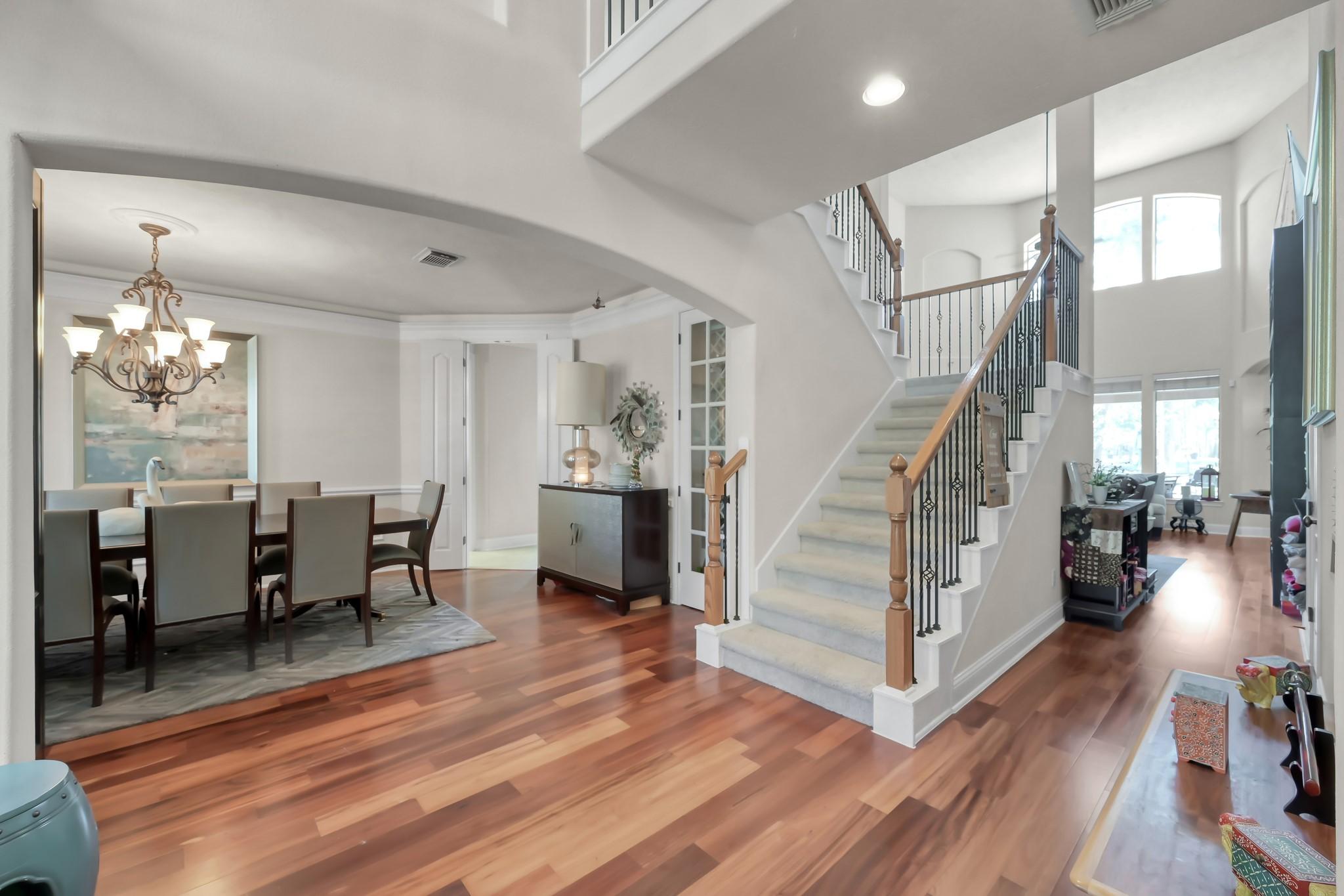 Image 3: Open entry. The spacious Formal Dining room to the