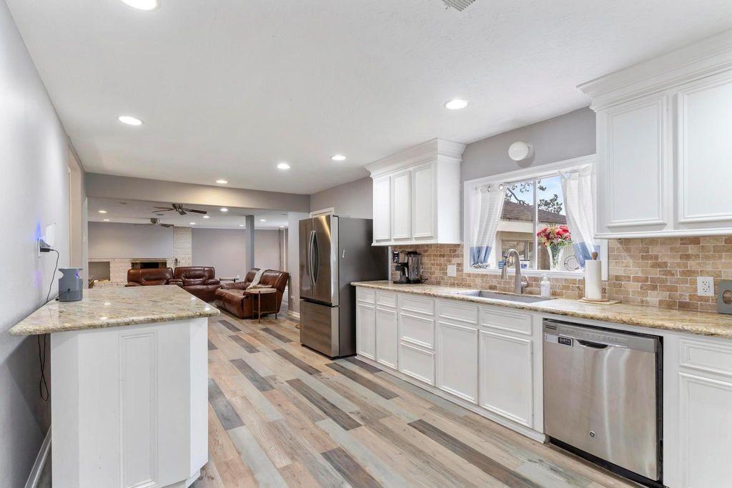 Image 4: Kitchen Island is on rolling casters!