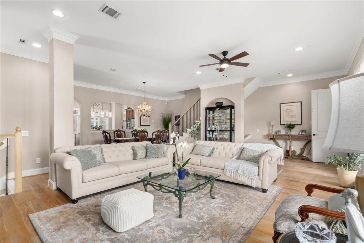 Image 3: Spacious and inviting, this elegant family room is