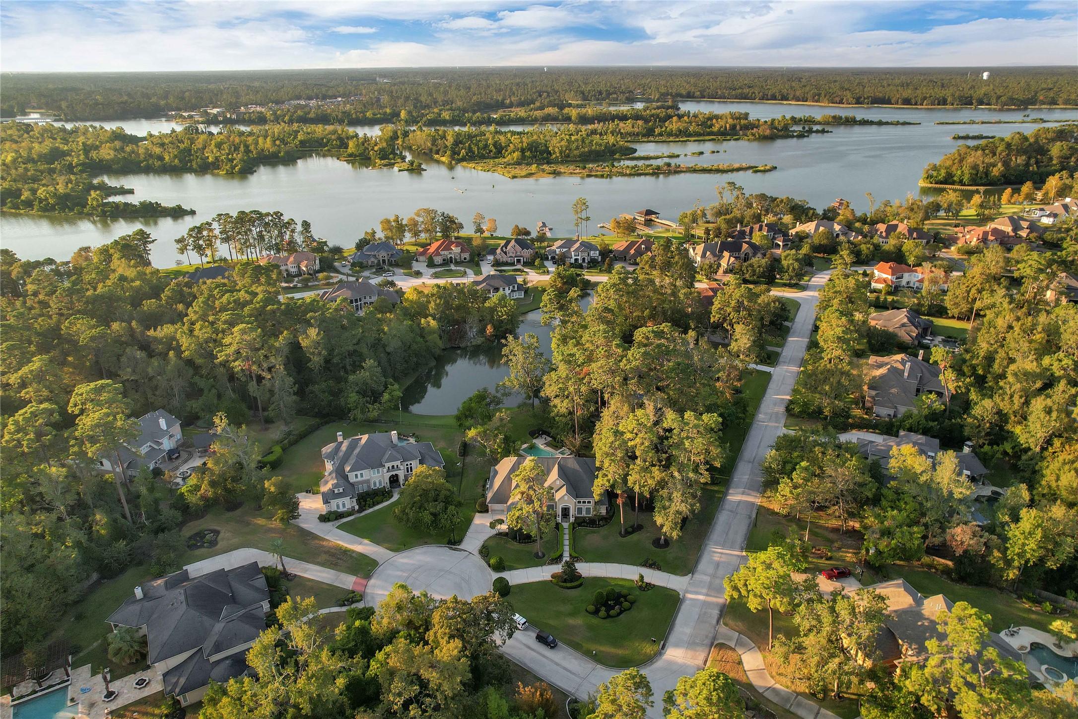 Image 1: Nestled in the tranquil gated community of Lakes a