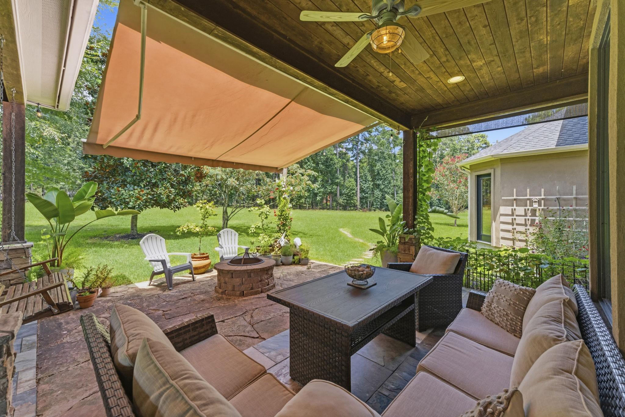 Image 2: Step outside to a private backyard retreat featuri