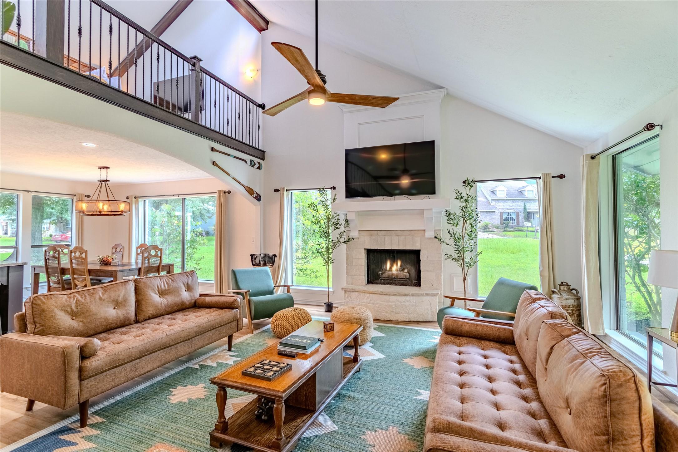 Image 2: GORGEOUS!! Vaulted ceilings, open living plan, and