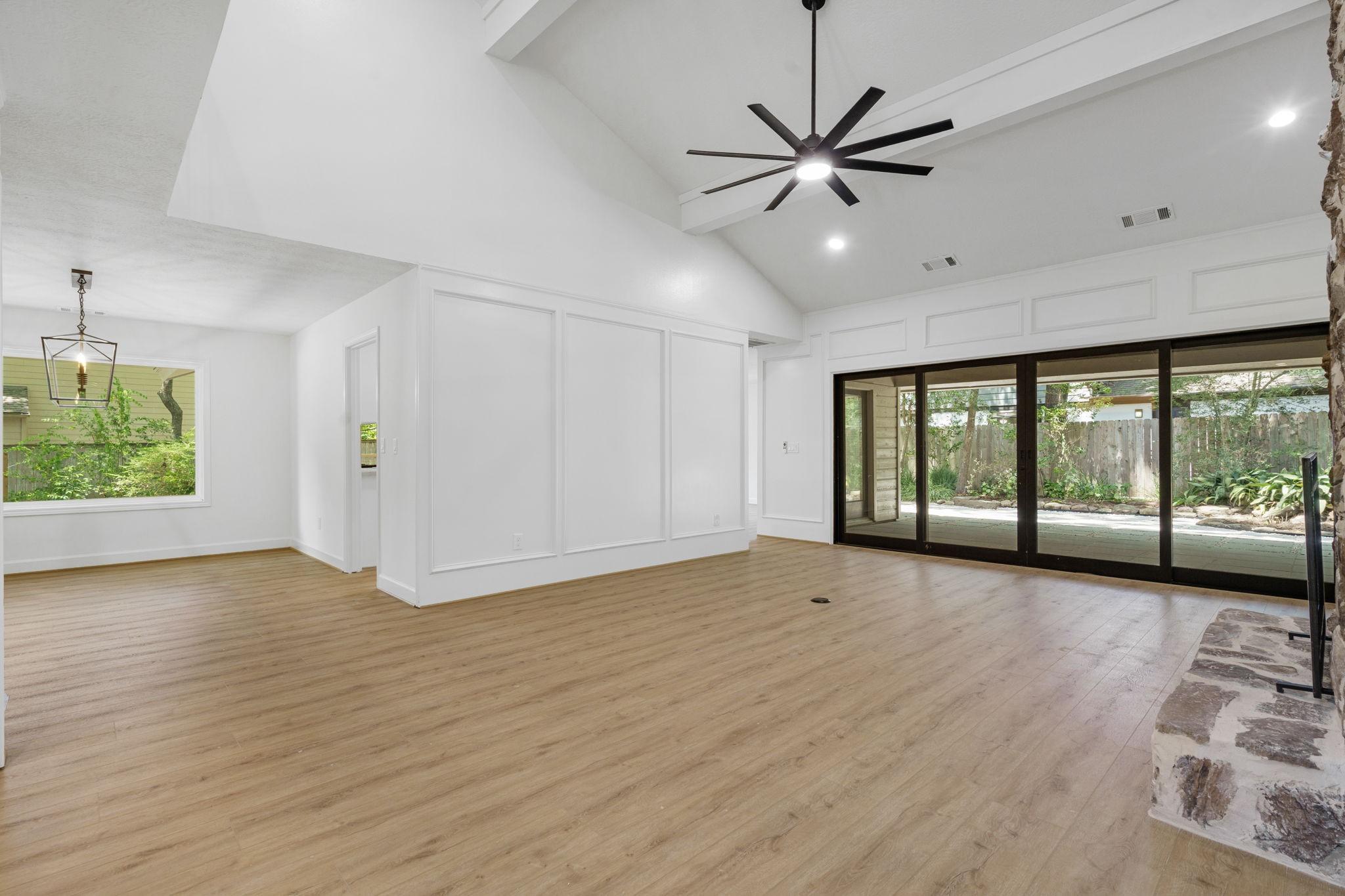 Image 2: At the back of the living room, brand-new sliding
