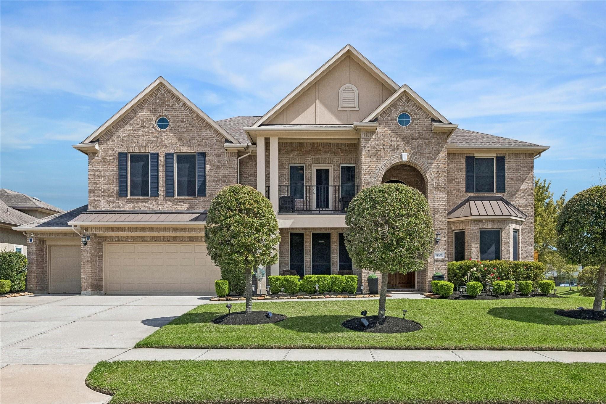 Image 2: Welcome home to this stunning brick residence, boa