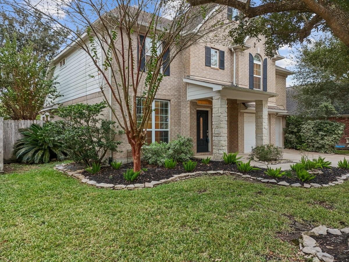 Image 2: Lush Landscaping with Sprinkler System