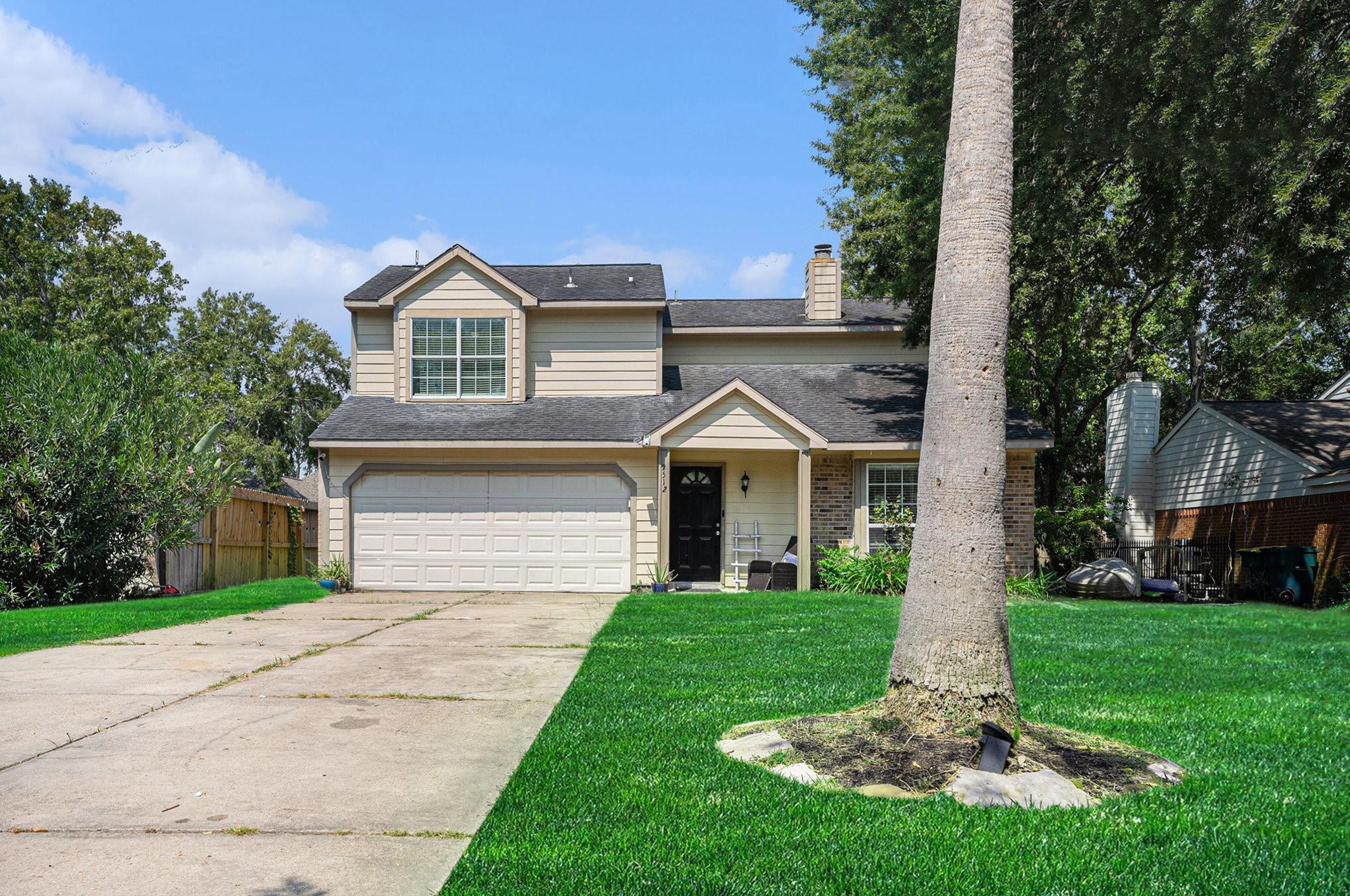 Image 2: Charming two-story home with a covered front porch