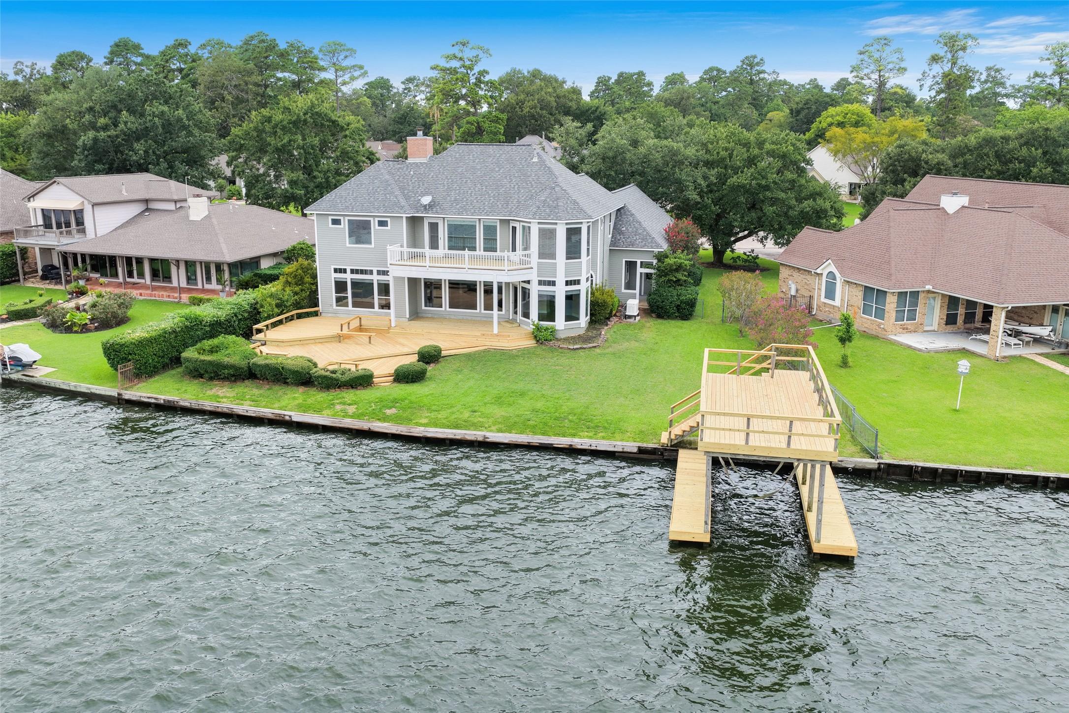 Image 3: This home sits on the open waters of Lake Conroe!