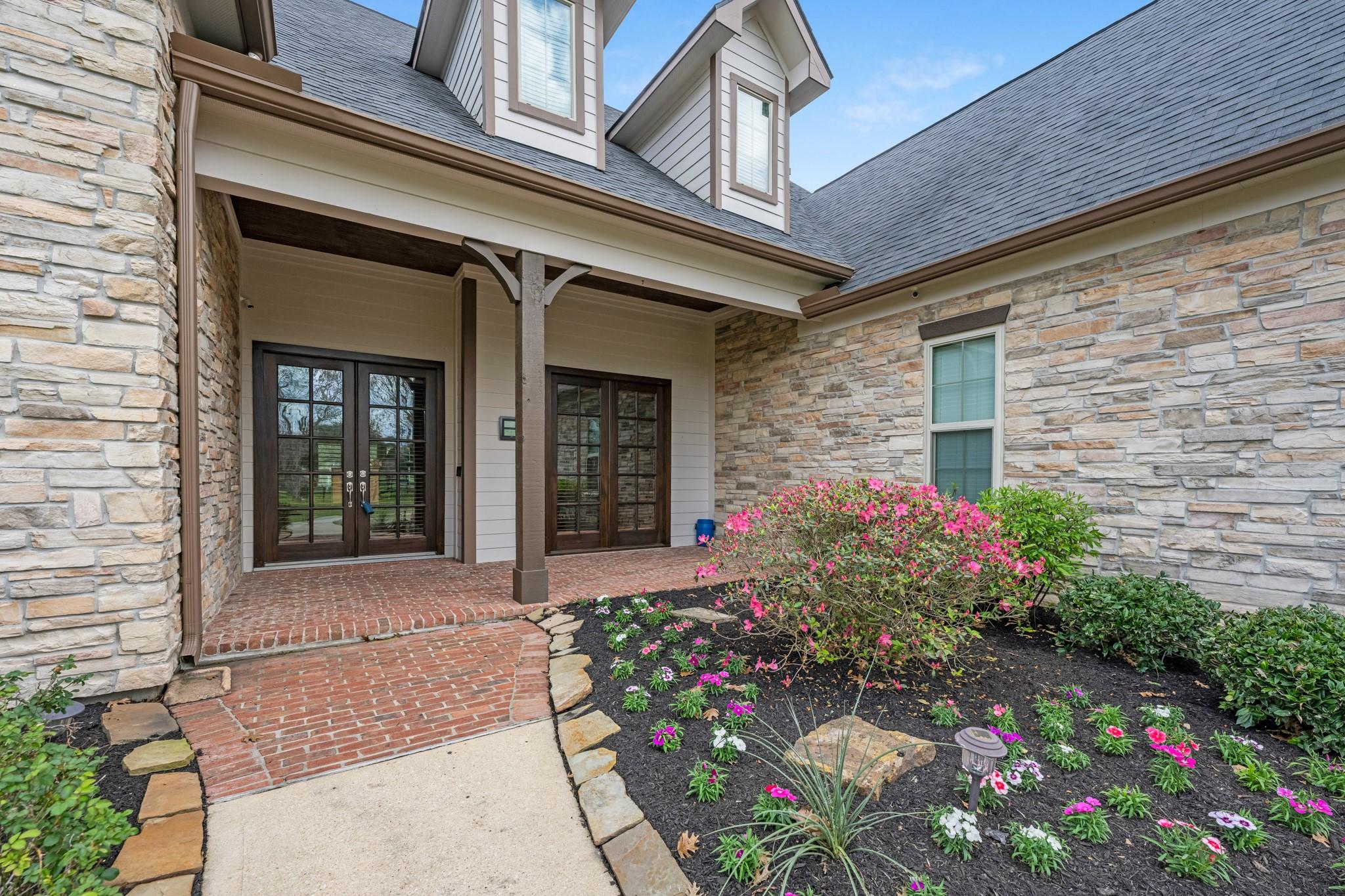 Image 4: A charming covered front porch invites quiet morni
