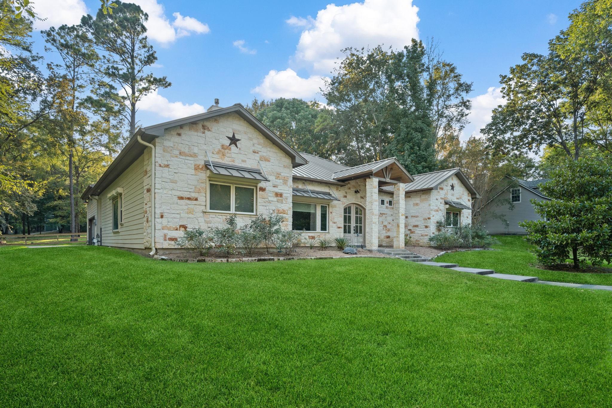 Image 2: The home features native Limestone and cement sidi