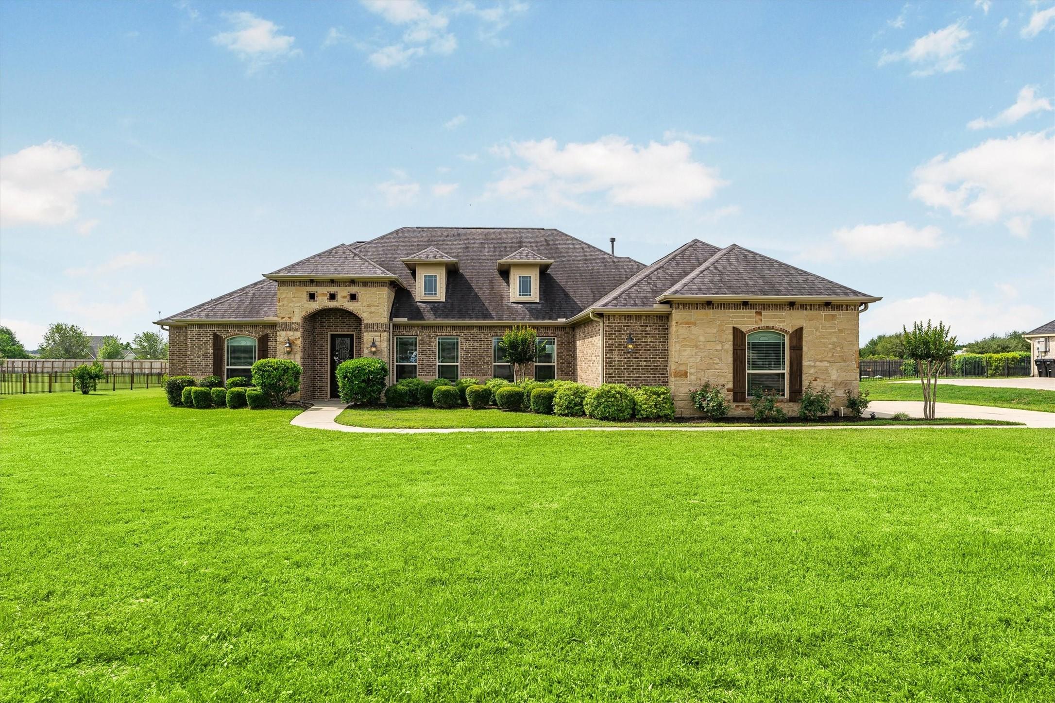 Image 1: Welcome Home! Custom home in beautiful gated Lake