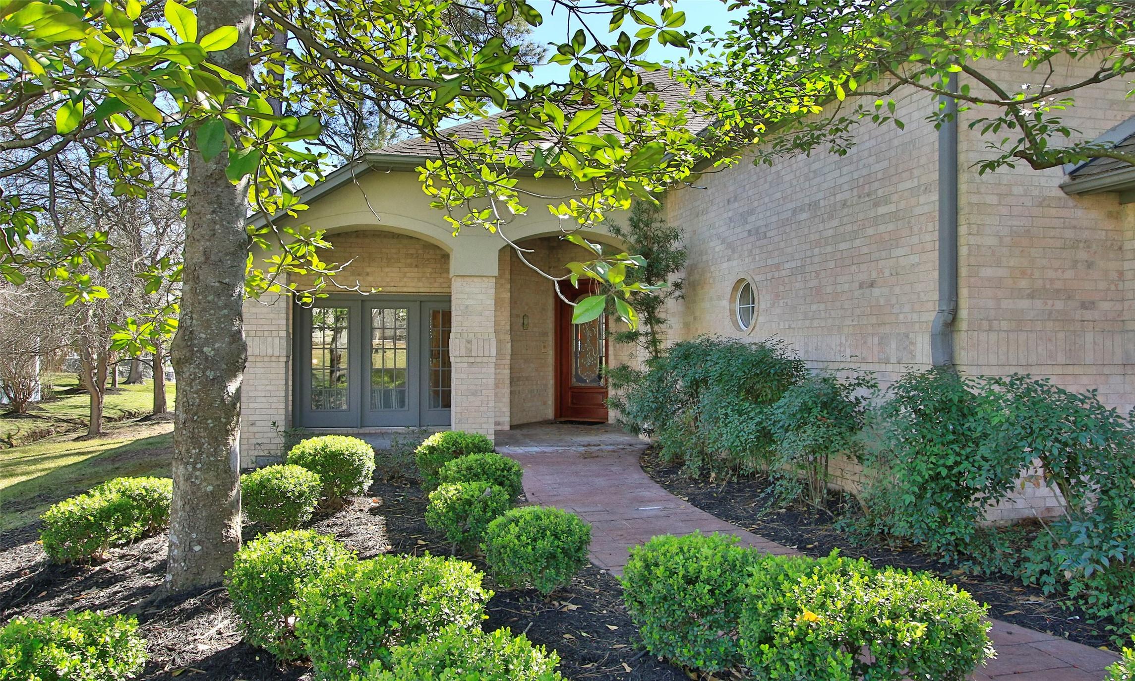 Image 2: A meandering sidewalk leads to your front entry, h