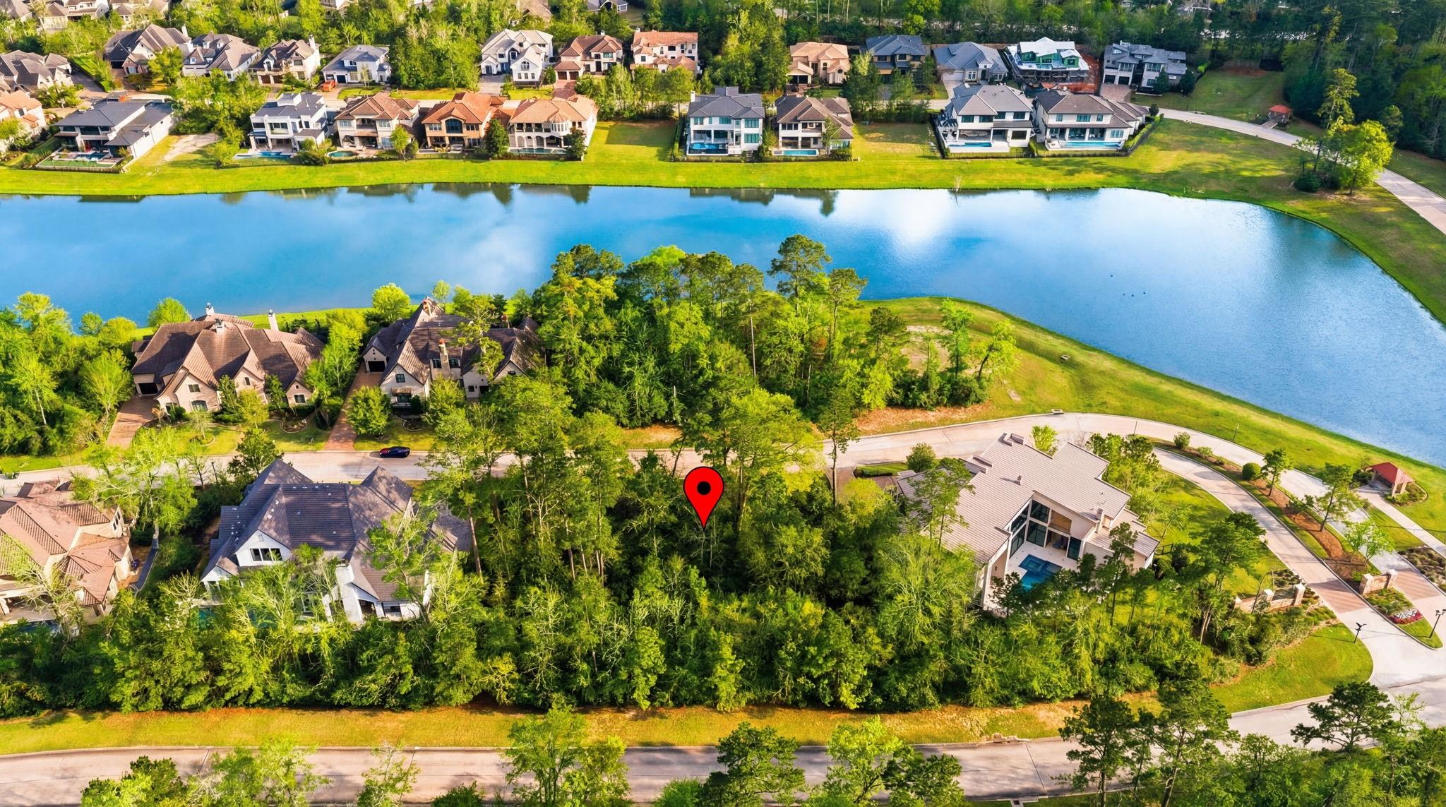 Image 2: This aerial photo showcases a serene residential a