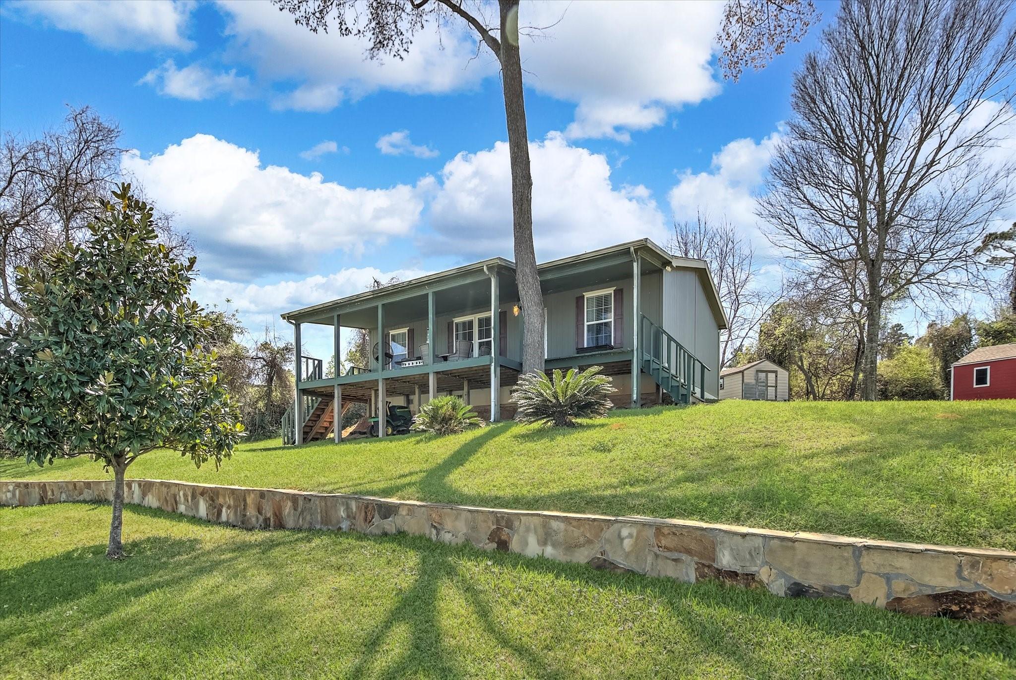 Image 3: View of the house from the water.