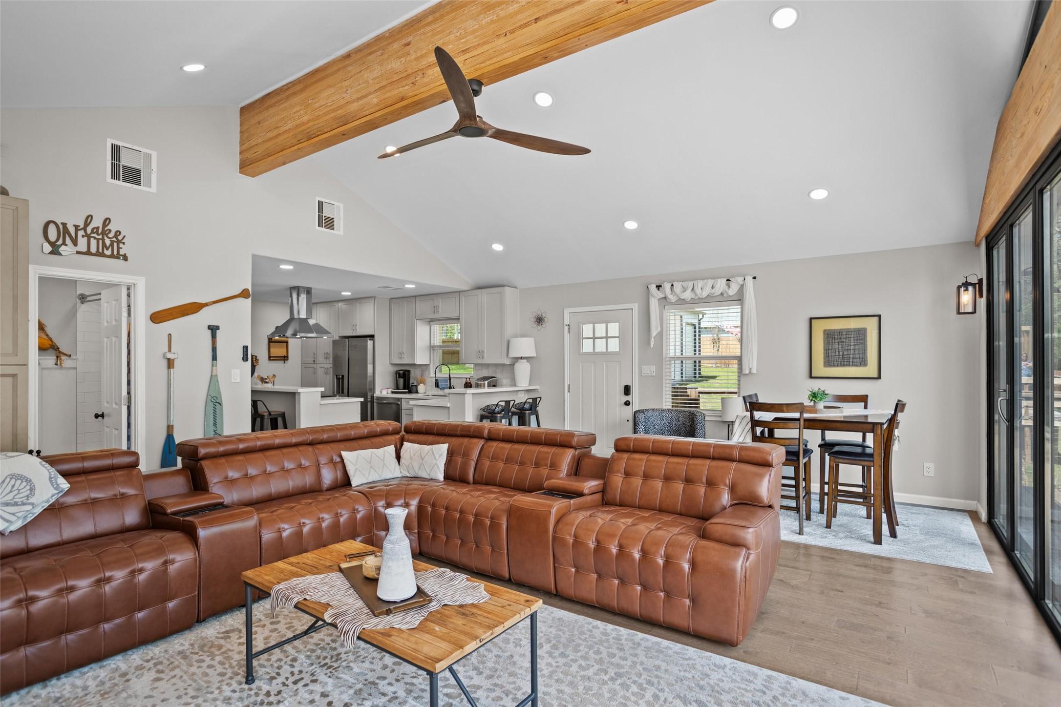 Image 2: Family room open concept to dining and kitchen are