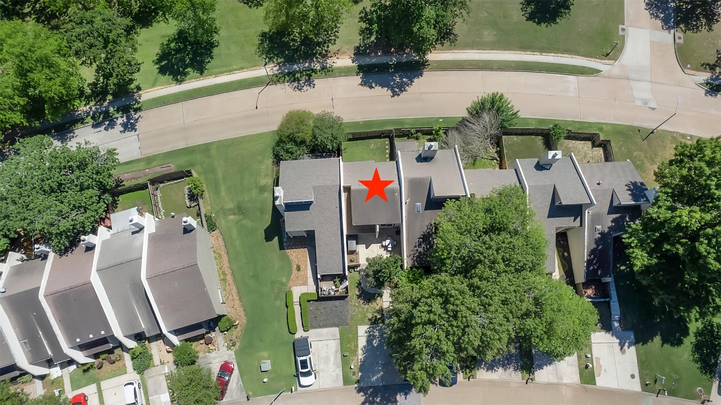 Image 2: An aerial view of the townhome. No back neighbors