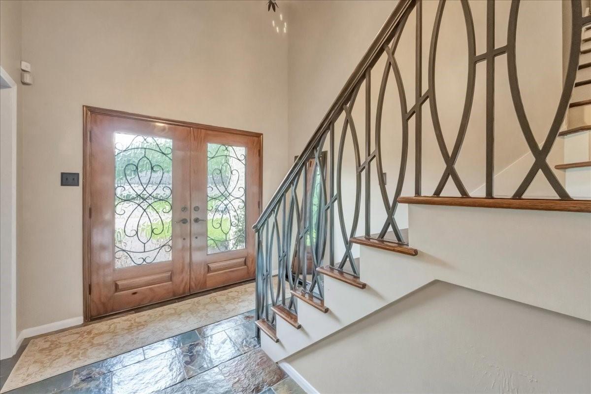 Image 3: Freshly painted entry and stair way.  Grand double