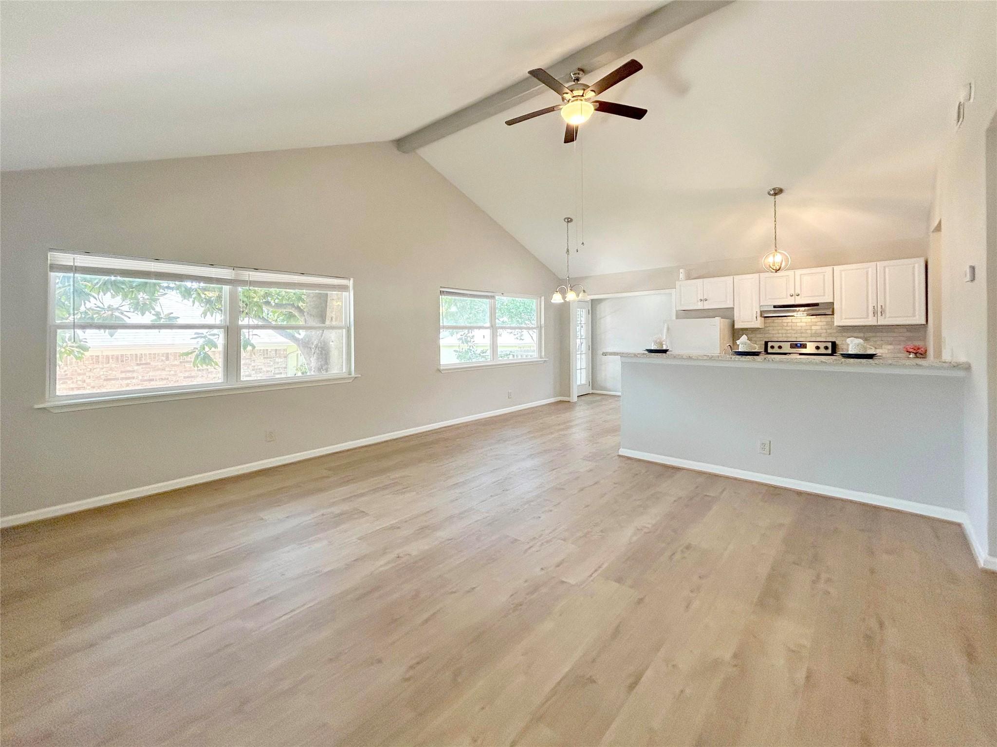 Image 3: Vaulted ceilings and loads of windows in this open