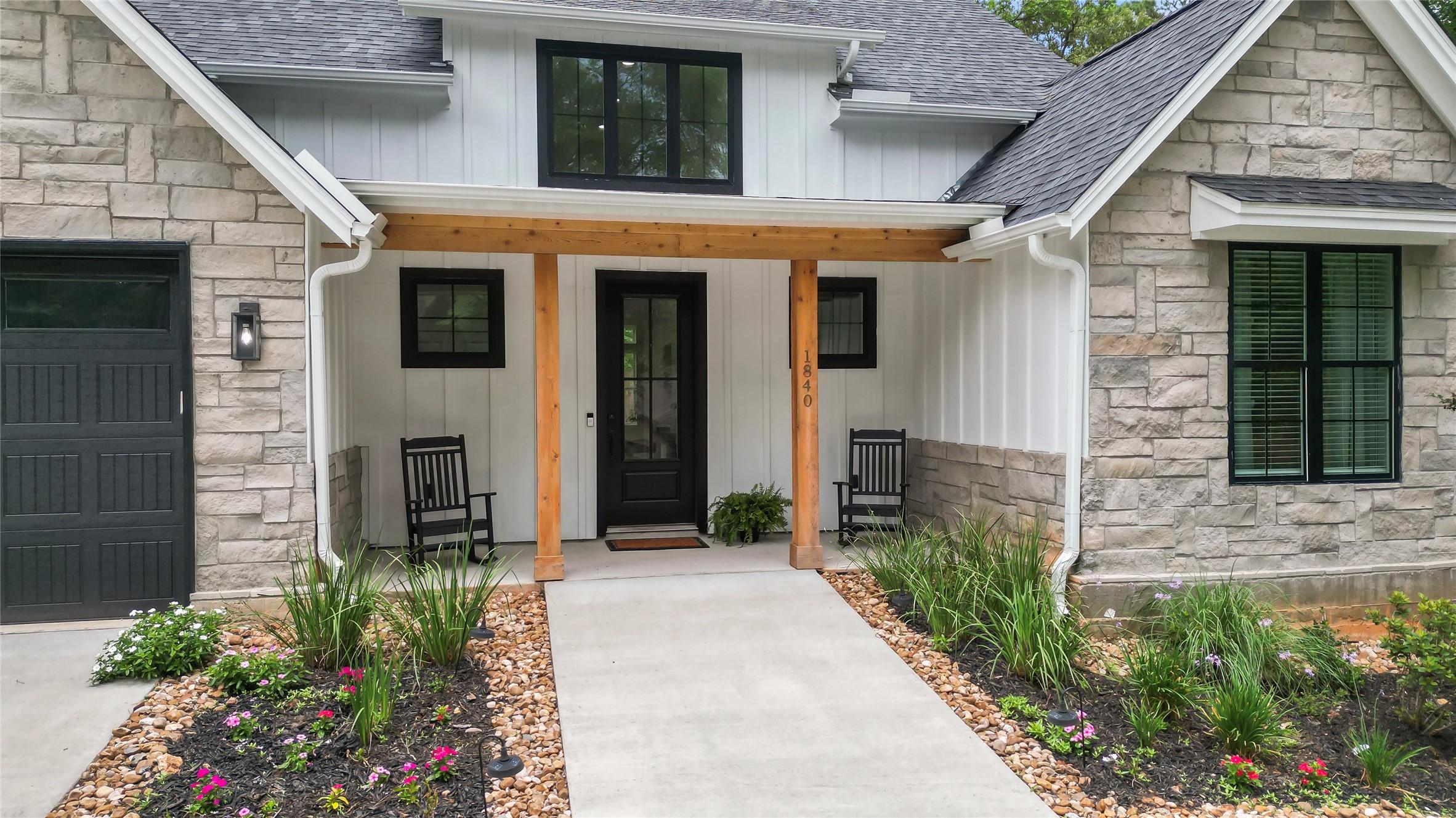 Image 3: This charming 3 bed/2bath home features a farmhous
