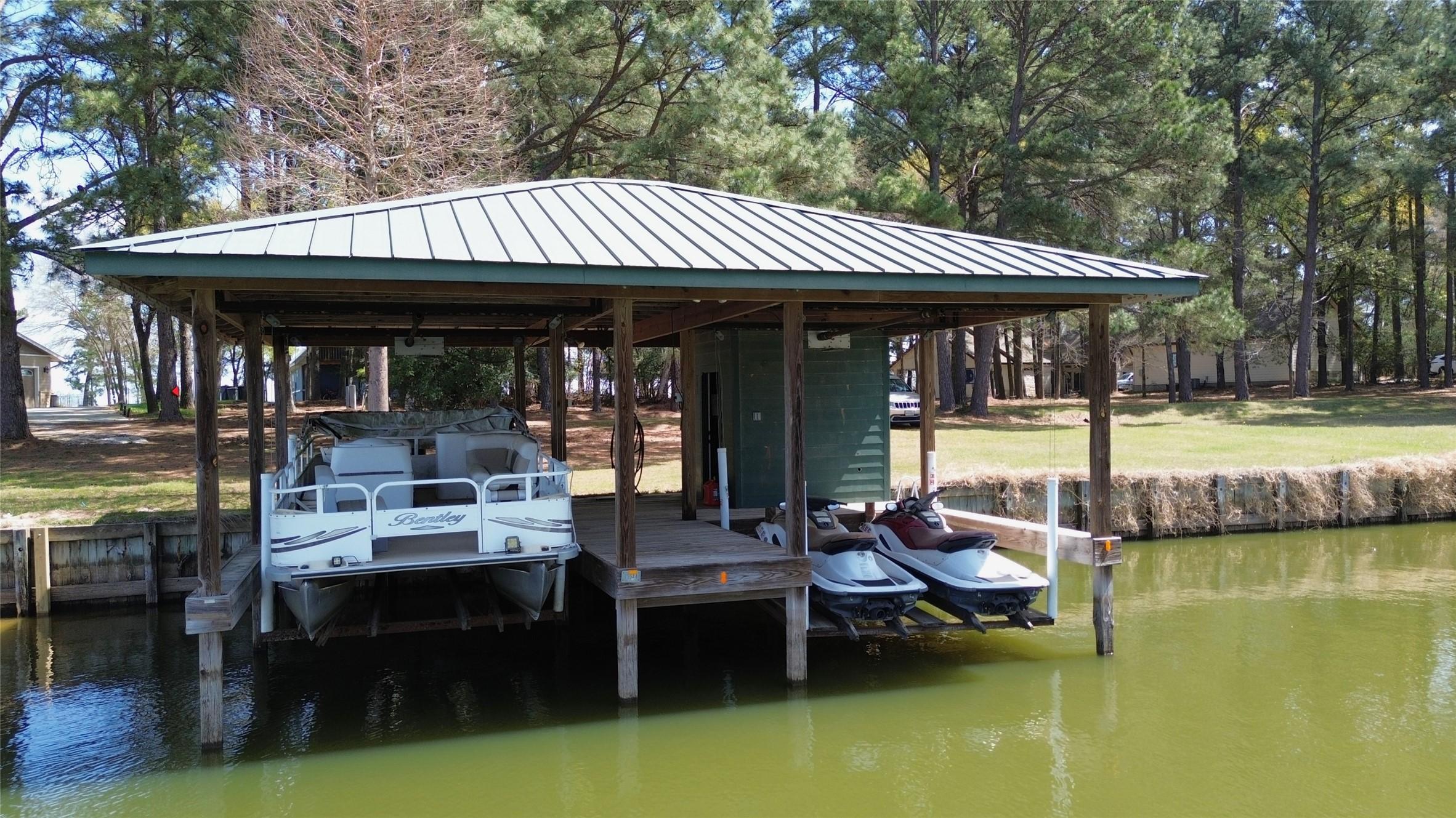 Image 3: Cove Side 2 Slip Boat House with Storage