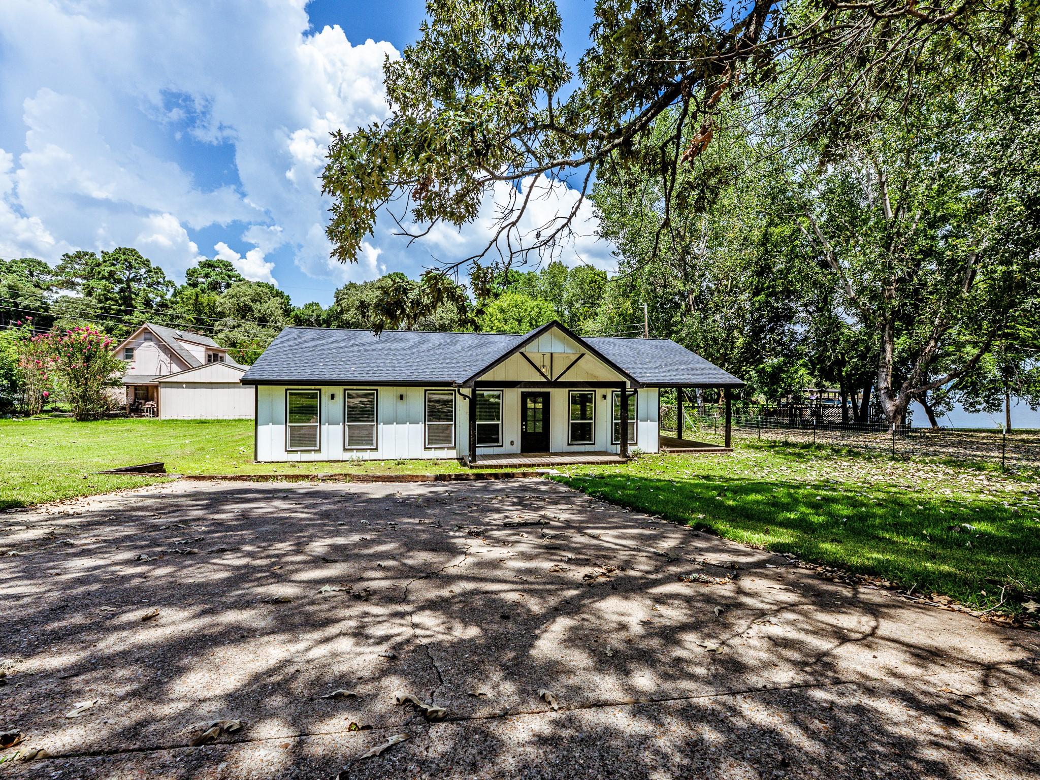 Image 3: Charming single-story home with a modern design, f