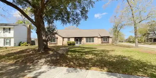Image 2: Charming single-story brick home on a corner lot w