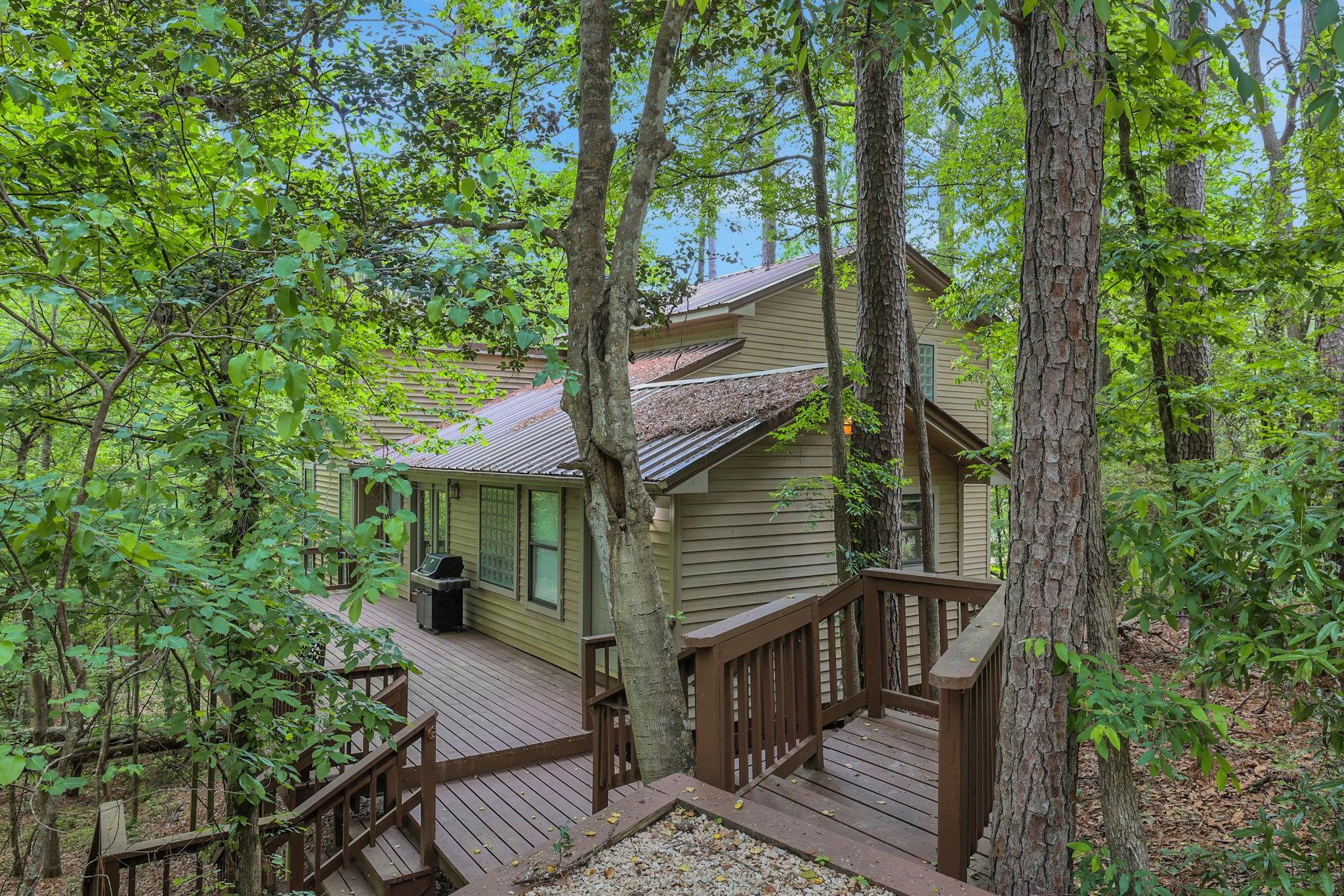 Image 1: Welcome to 701 Lakeview Estates Drive - tucked amo
