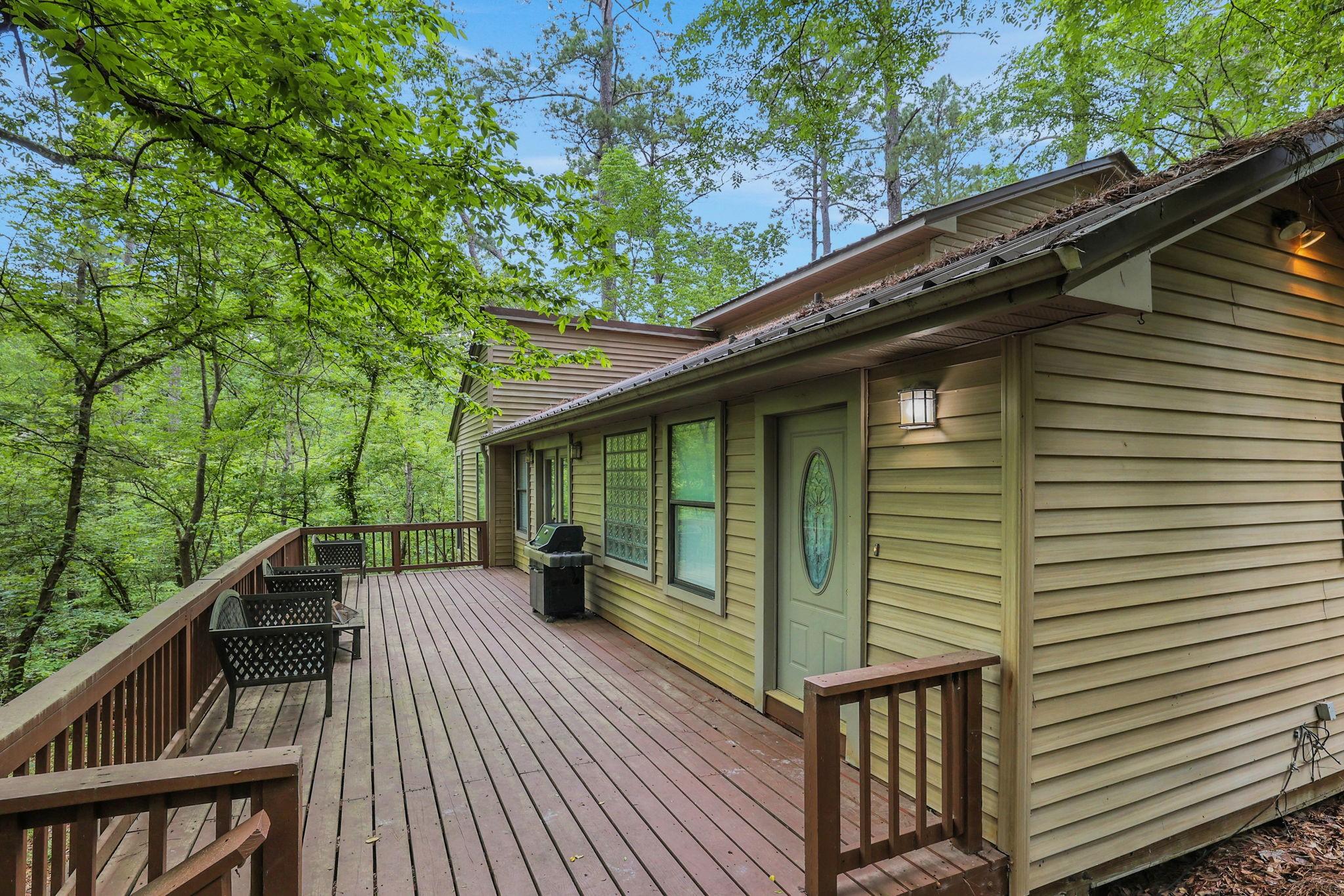 Image 2: The spacious front deck is a great place to relax