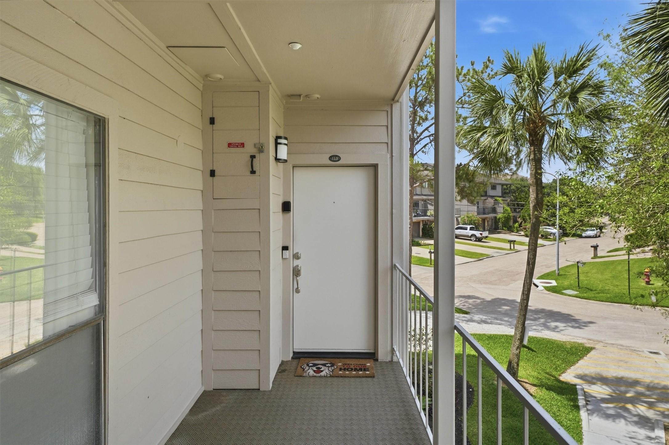 Image 3: Welcoming private entry tucked into this desirable