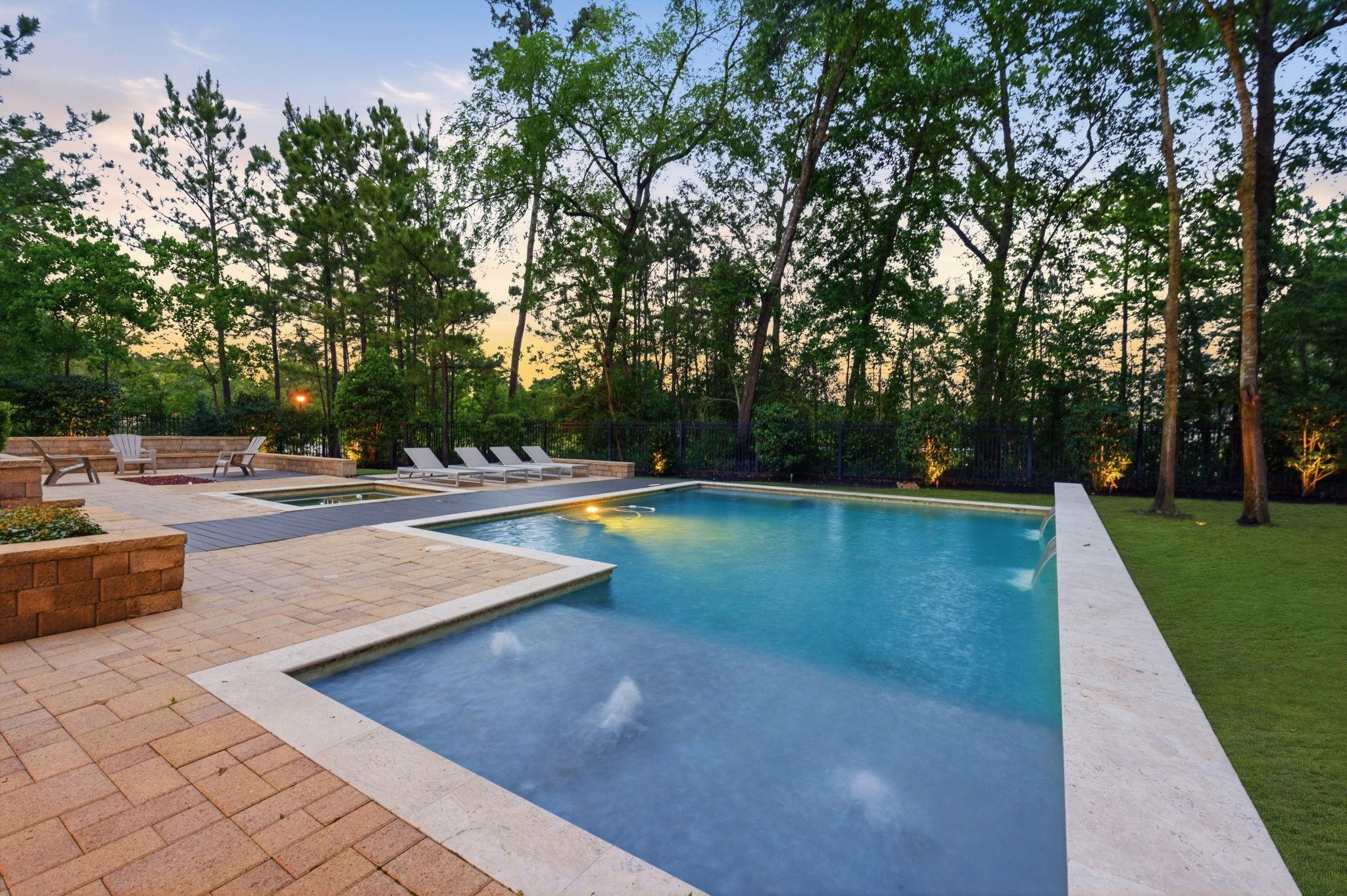 Image 3: Enjoy peaceful evenings in this backyard paradise!