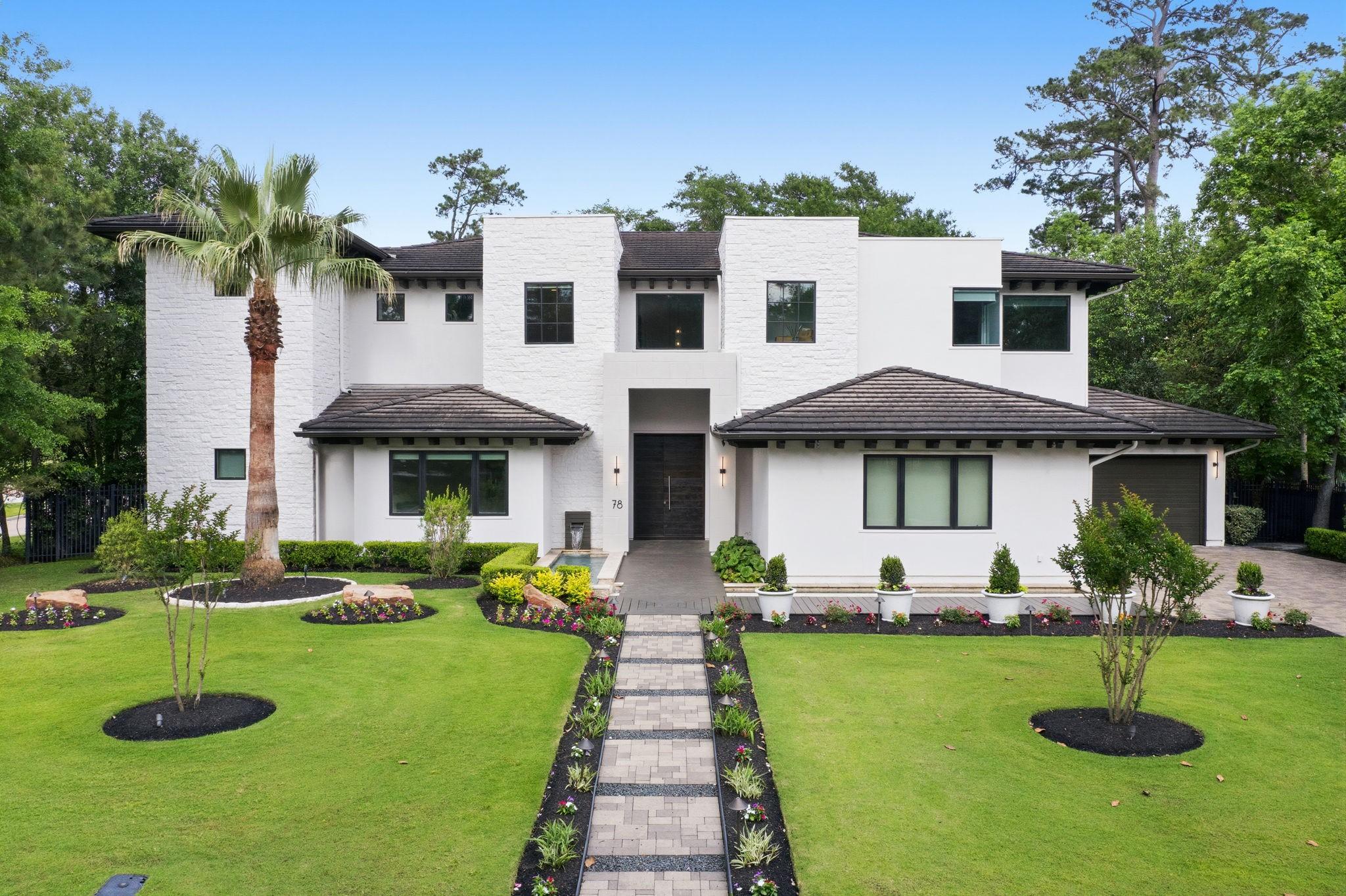 Image 4: Impeccable stone and stucco curb appeal with moder
