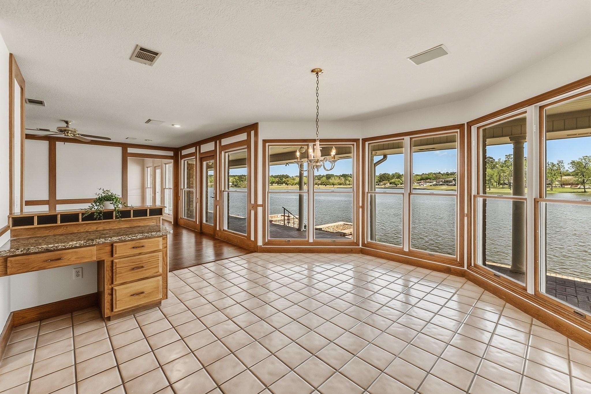 Image 2: Views of the lake from every room at the back of t