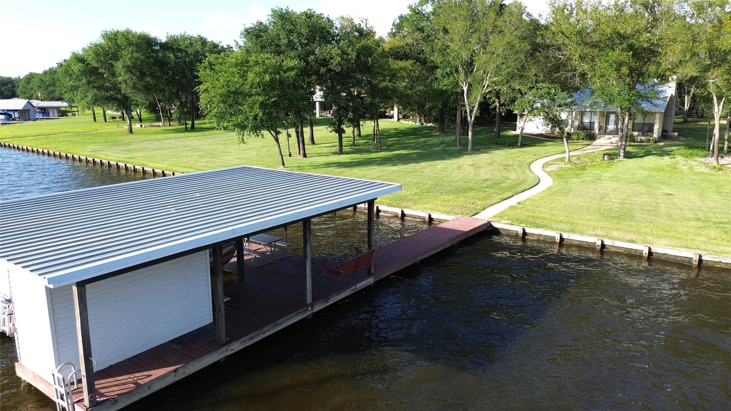 Image 2: Aerial View of Property from Boat House